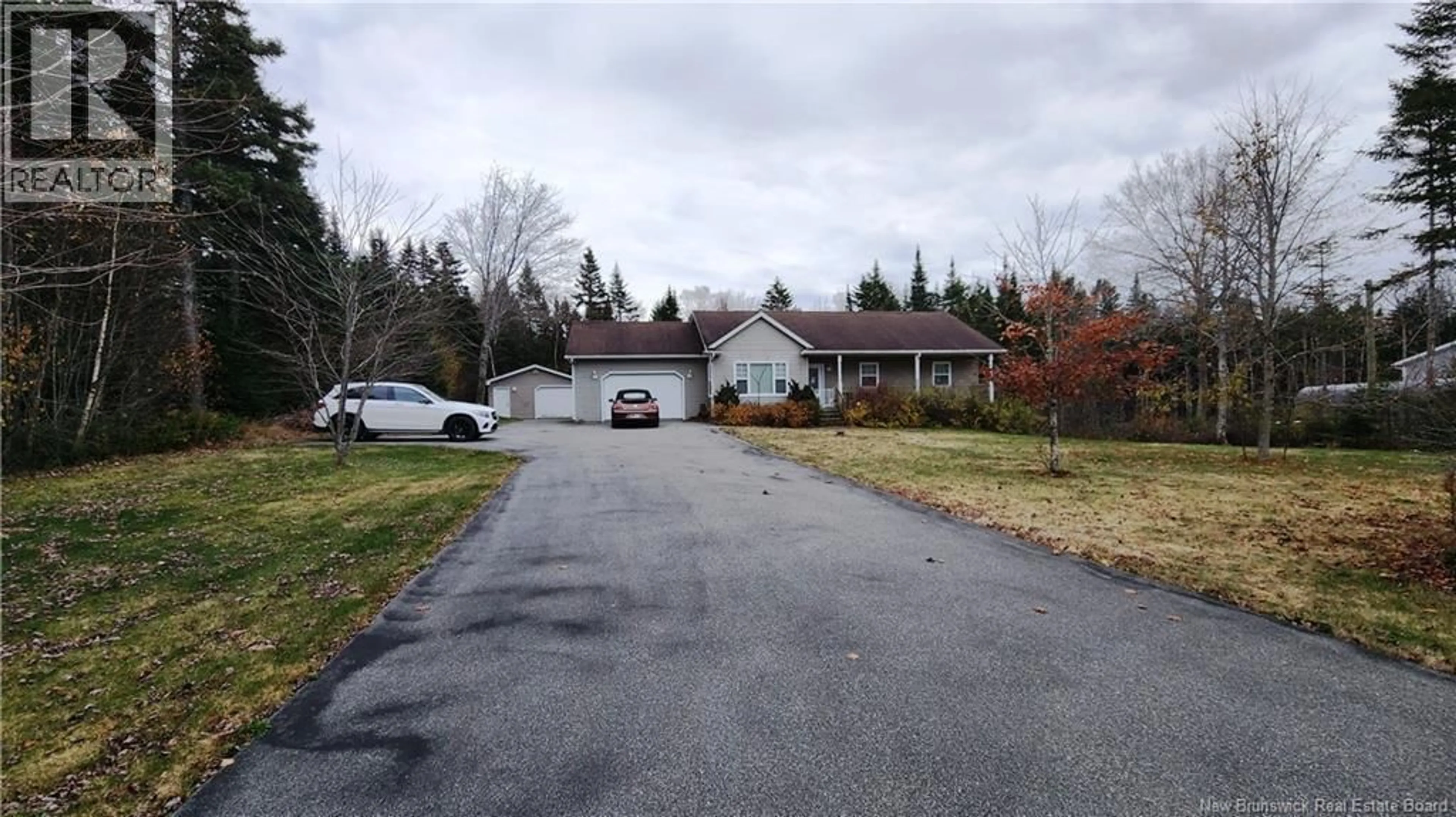 A pic from outside/outdoor area/front of a property/back of a property/a pic from drone, street for 890 HILLCREST ROAD, Saint John New Brunswick E2E2B2