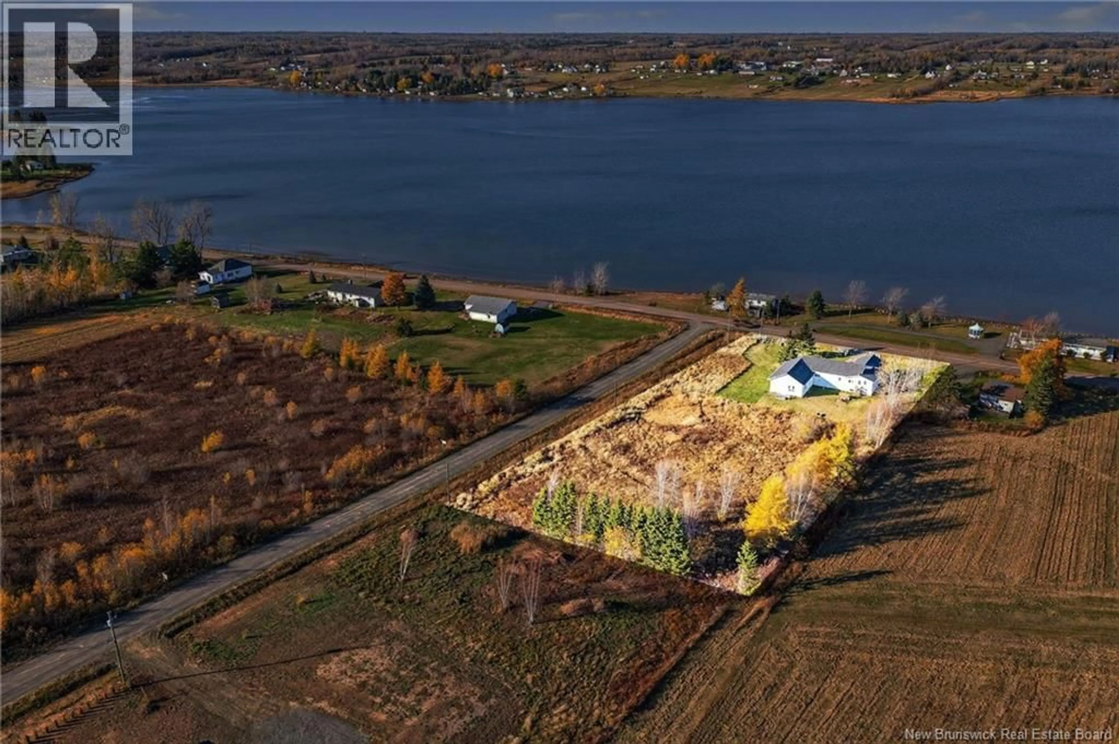 A pic from outside/outdoor area/front of a property/back of a property/a pic from drone, water/lake/river/ocean view for 1435 COCAGNE SUD, Notre-Dame New Brunswick E4V1W7