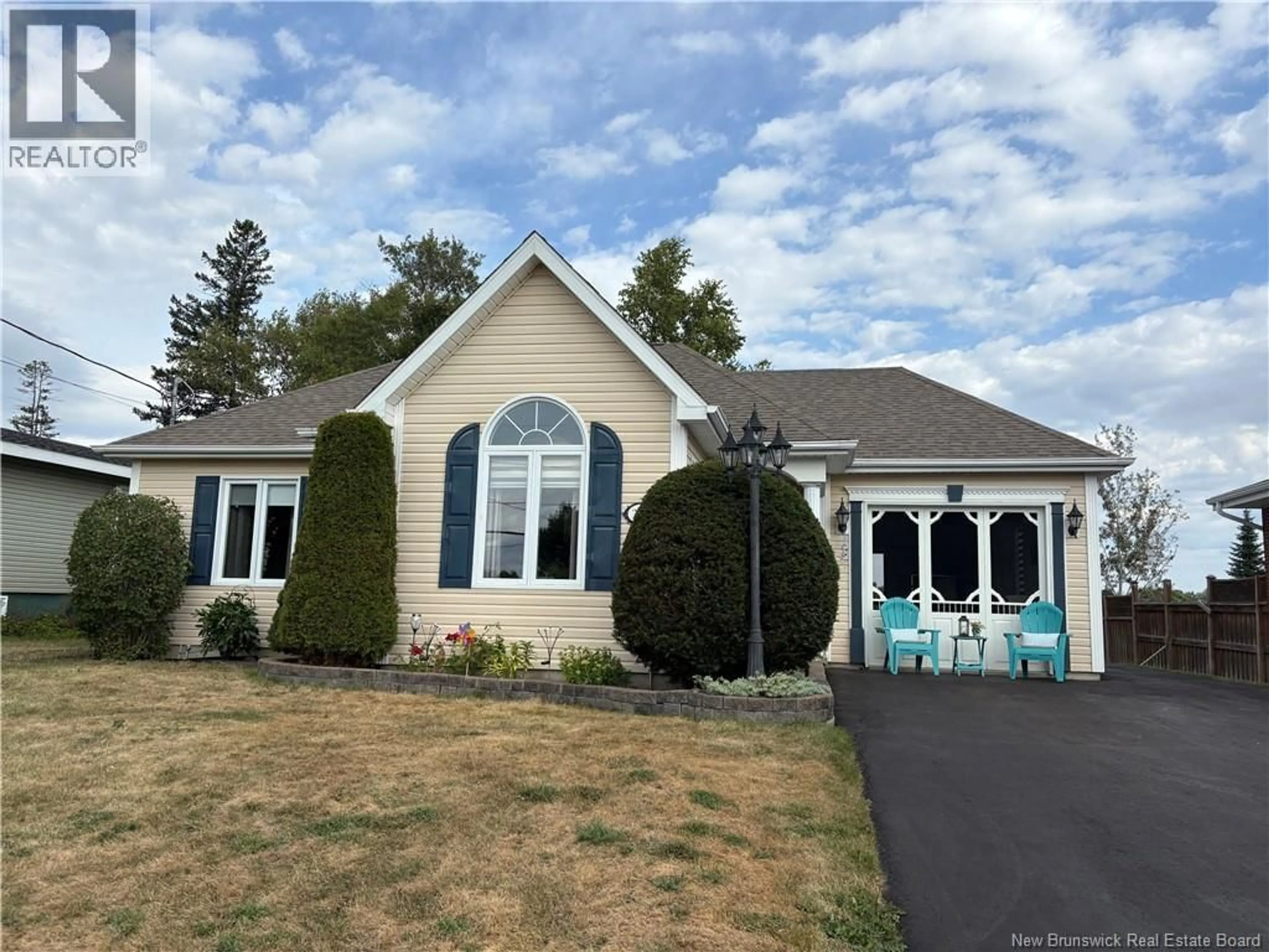 Home with vinyl exterior material, street for 244 MARIE STREET, Beresford New Brunswick E8K1P8