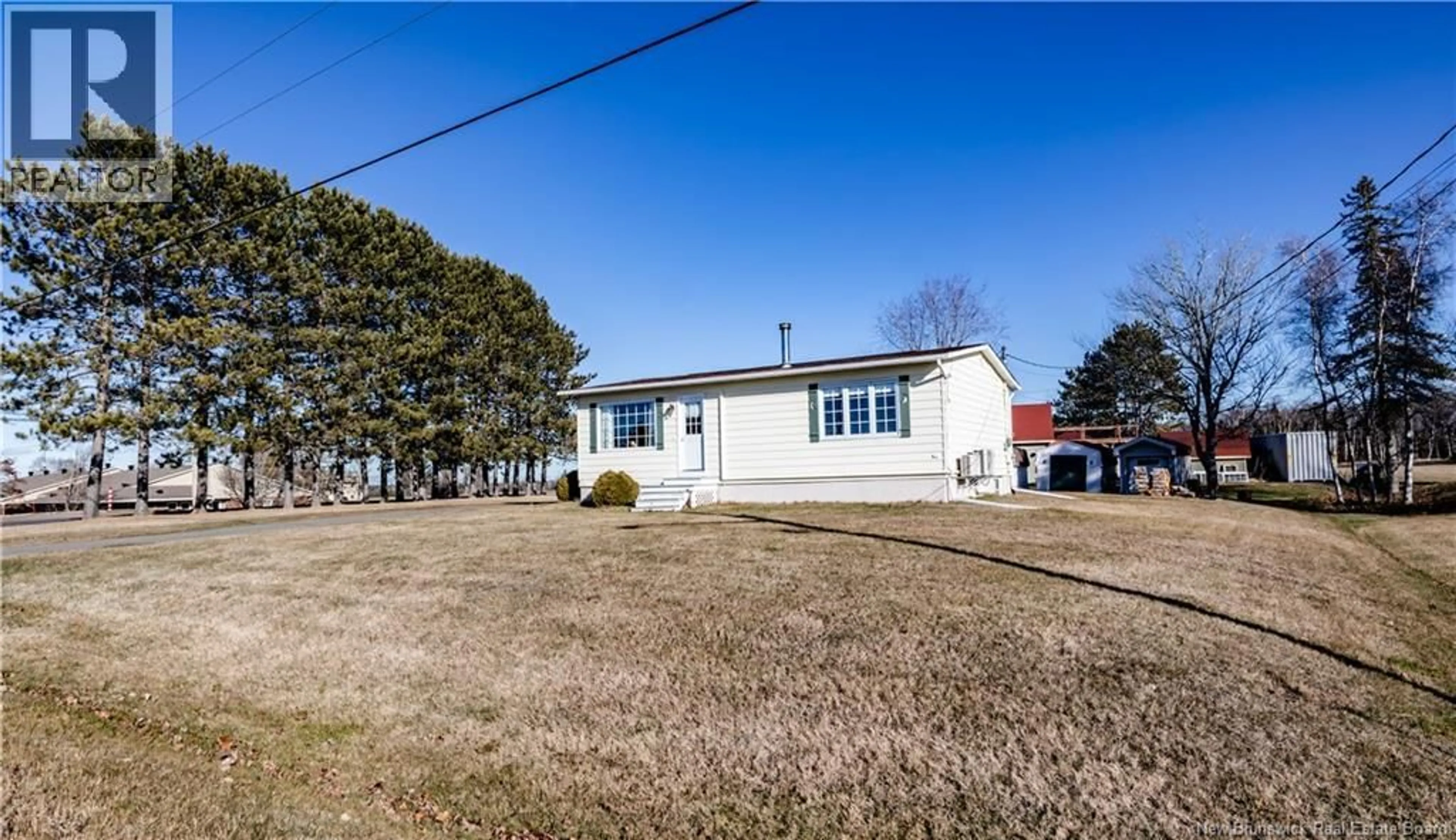 A pic from outside/outdoor area/front of a property/back of a property/a pic from drone, street for 1 PERE BERUBE STREET, Saint-Ignace New Brunswick E4X2G9