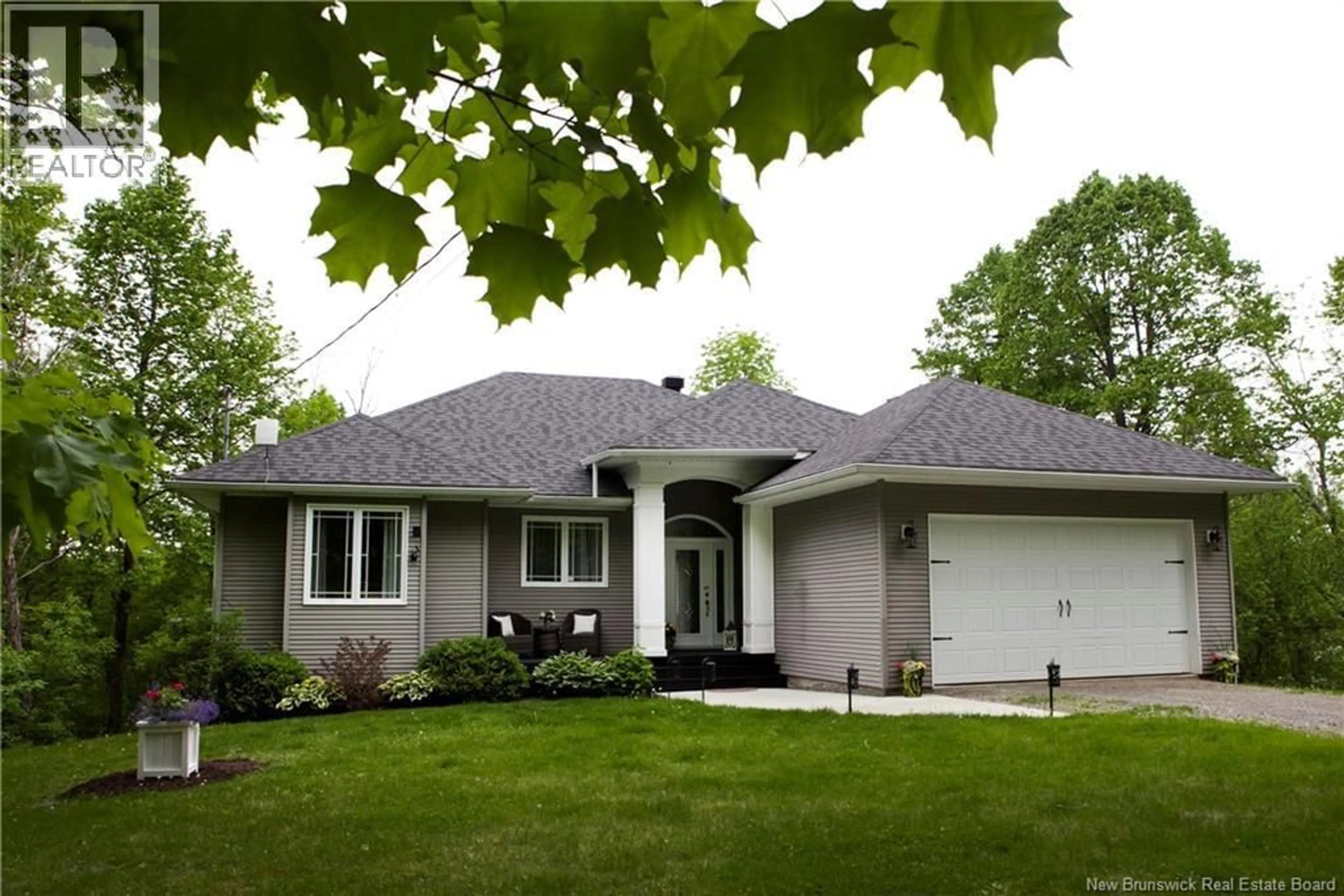 Home with vinyl exterior material, street for 5189 105 ROUTE, Grafton New Brunswick E7N1S3