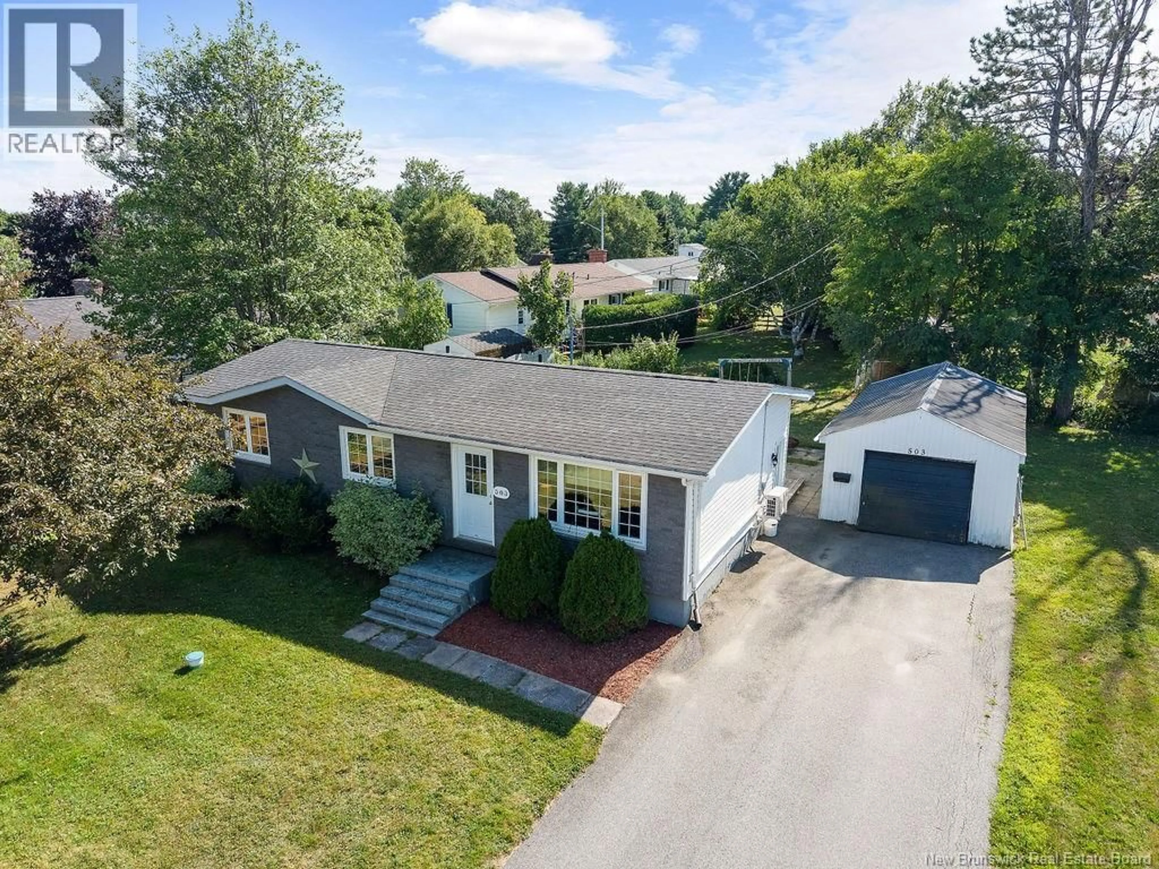 A pic from outside/outdoor area/front of a property/back of a property/a pic from drone, street for 503 MACMILLAN DRIVE, Miramichi New Brunswick E1V3R8