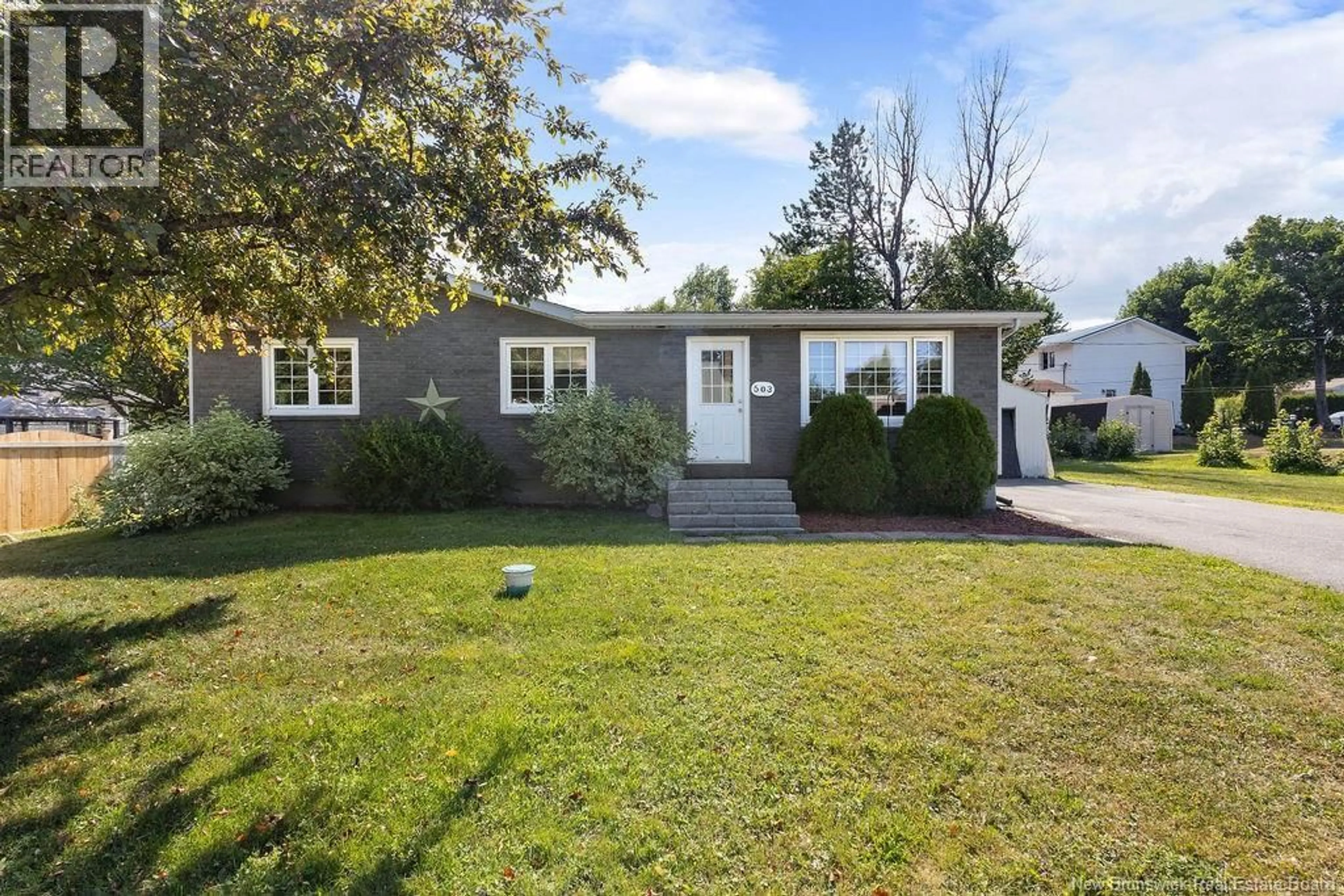 Home with vinyl exterior material, street for 503 MACMILLAN DRIVE, Miramichi New Brunswick E1V3R8