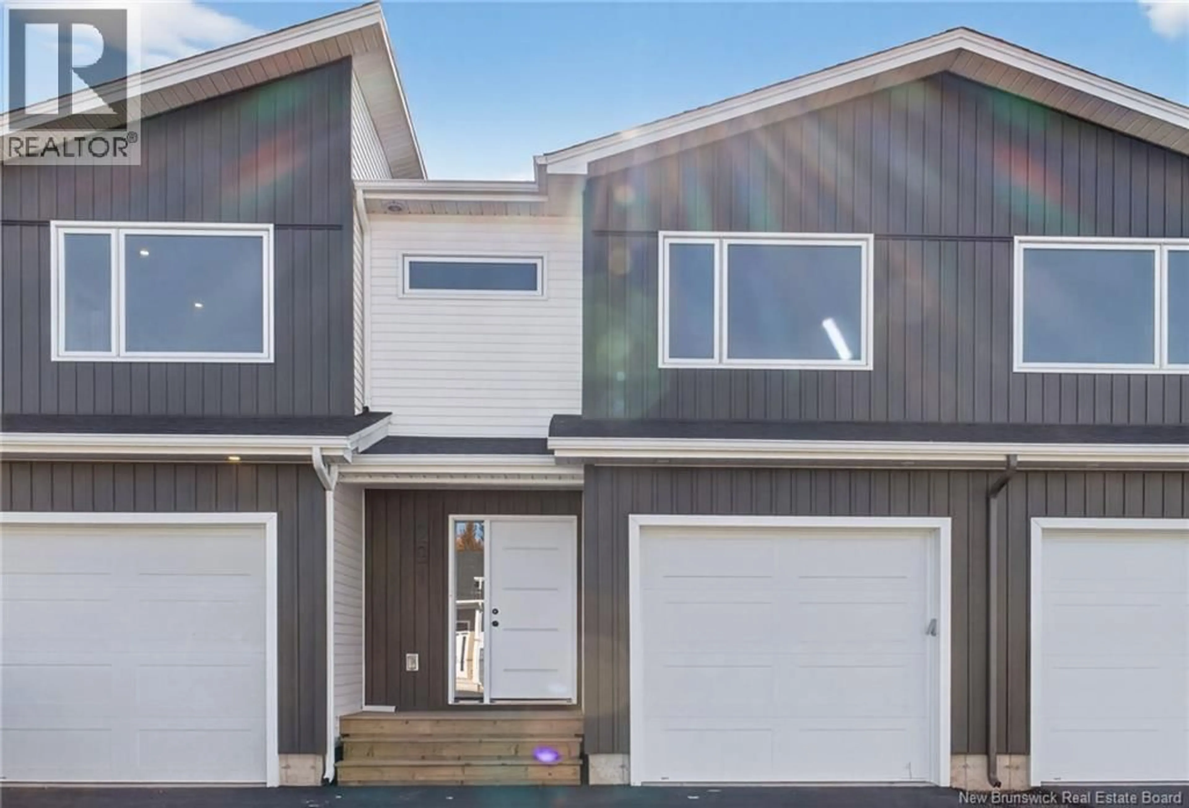 Home with vinyl exterior material, street for 293 ELSLIGER STREET, Dieppe New Brunswick E1H2B9