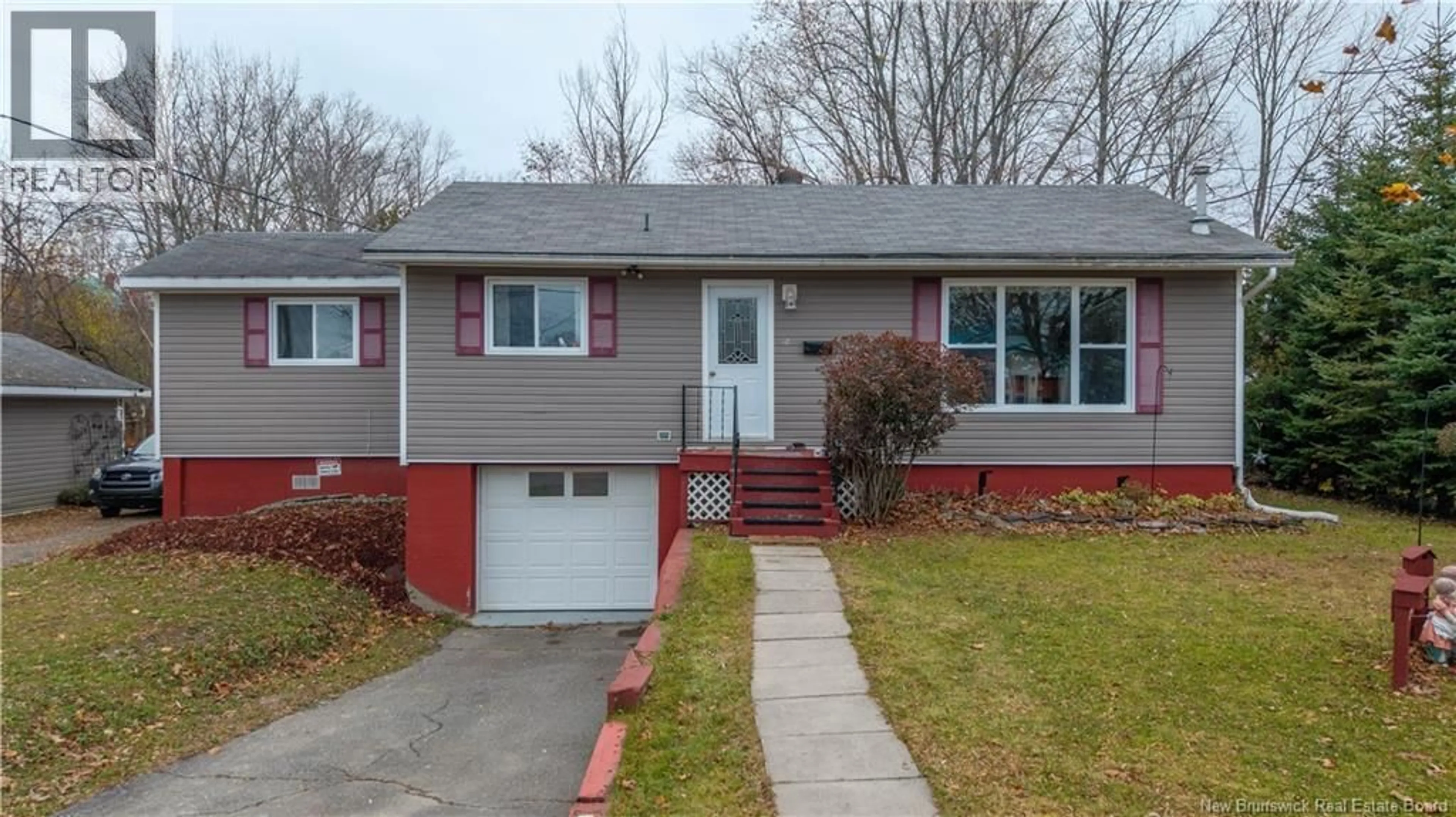 Home with vinyl exterior material, street for 18 SCHOOL STREET, St. Stephen New Brunswick E3L2N6