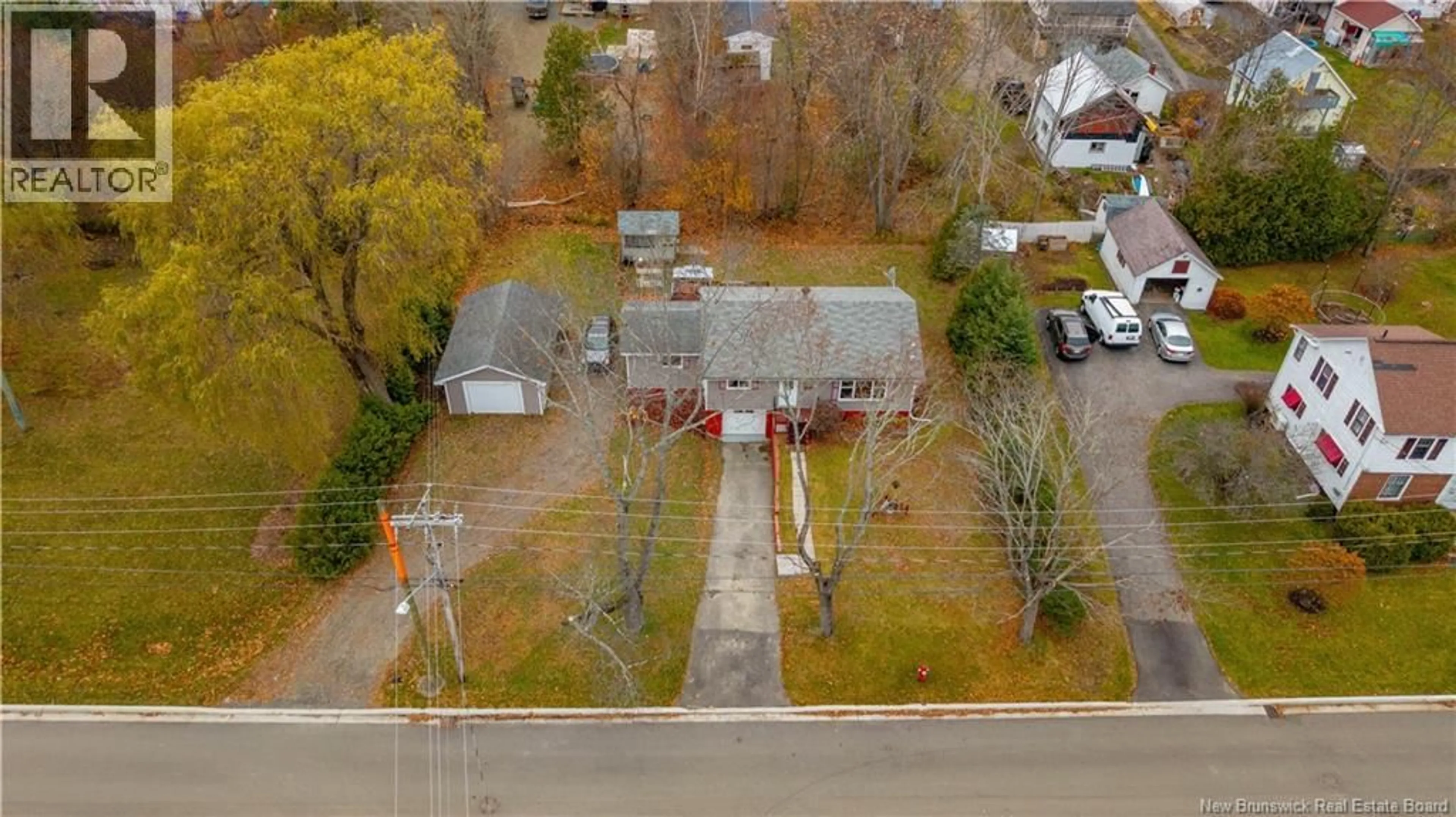 A pic from outside/outdoor area/front of a property/back of a property/a pic from drone, street for 18 SCHOOL STREET, St. Stephen New Brunswick E3L2N6