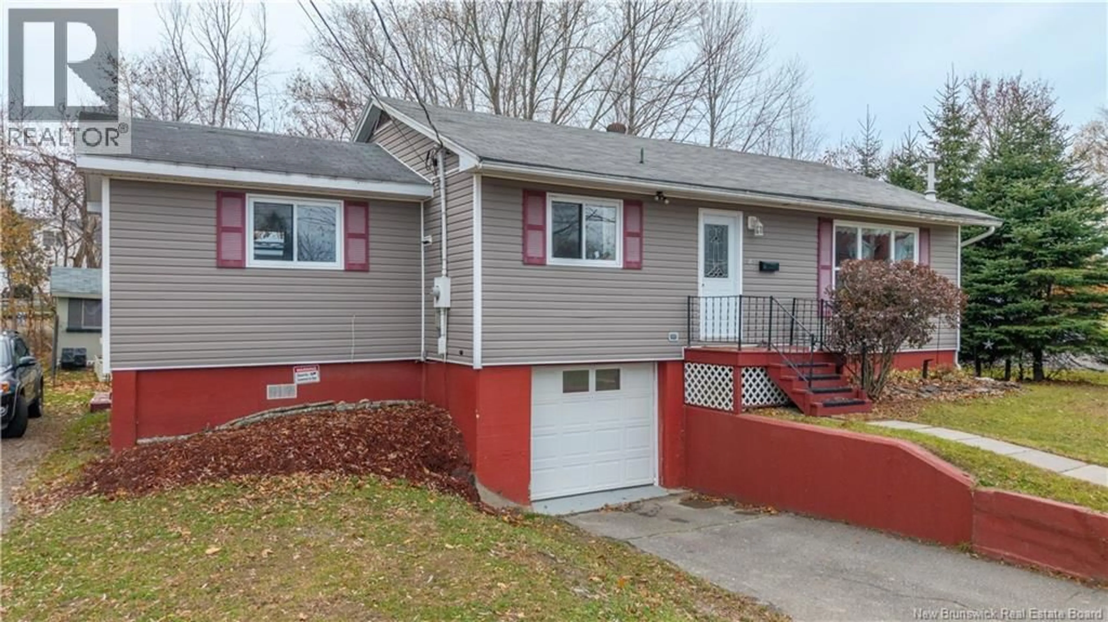 Home with vinyl exterior material, street for 18 SCHOOL STREET, St. Stephen New Brunswick E3L2N6