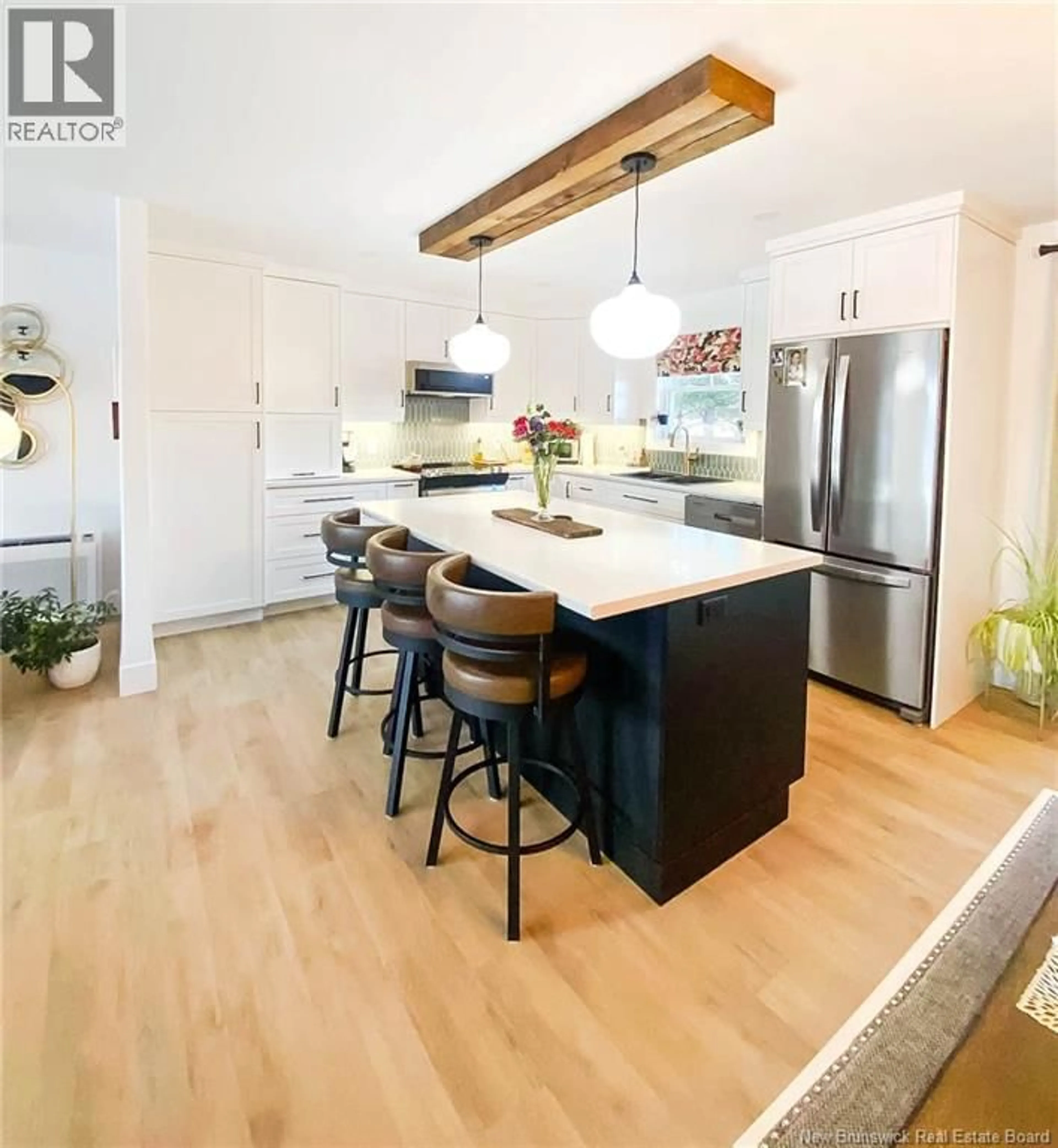 Open concept kitchen, wood/laminate floor for 1038 ROUTE 425 HIGHWAY, Whitney New Brunswick E1V4K8