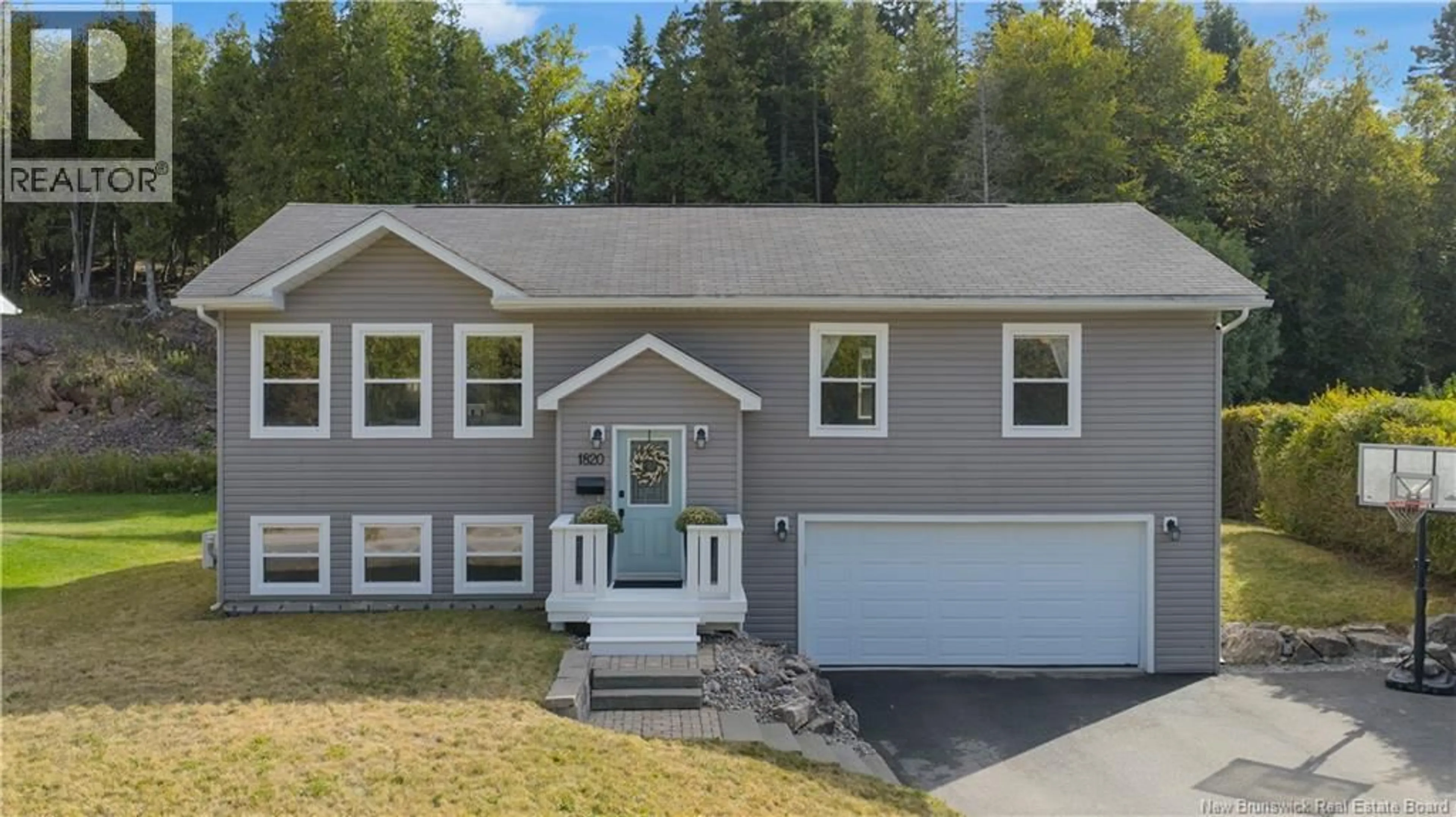 Home with vinyl exterior material, street for 1820 SANDY POINT ROAD, Saint John New Brunswick E2K5E9