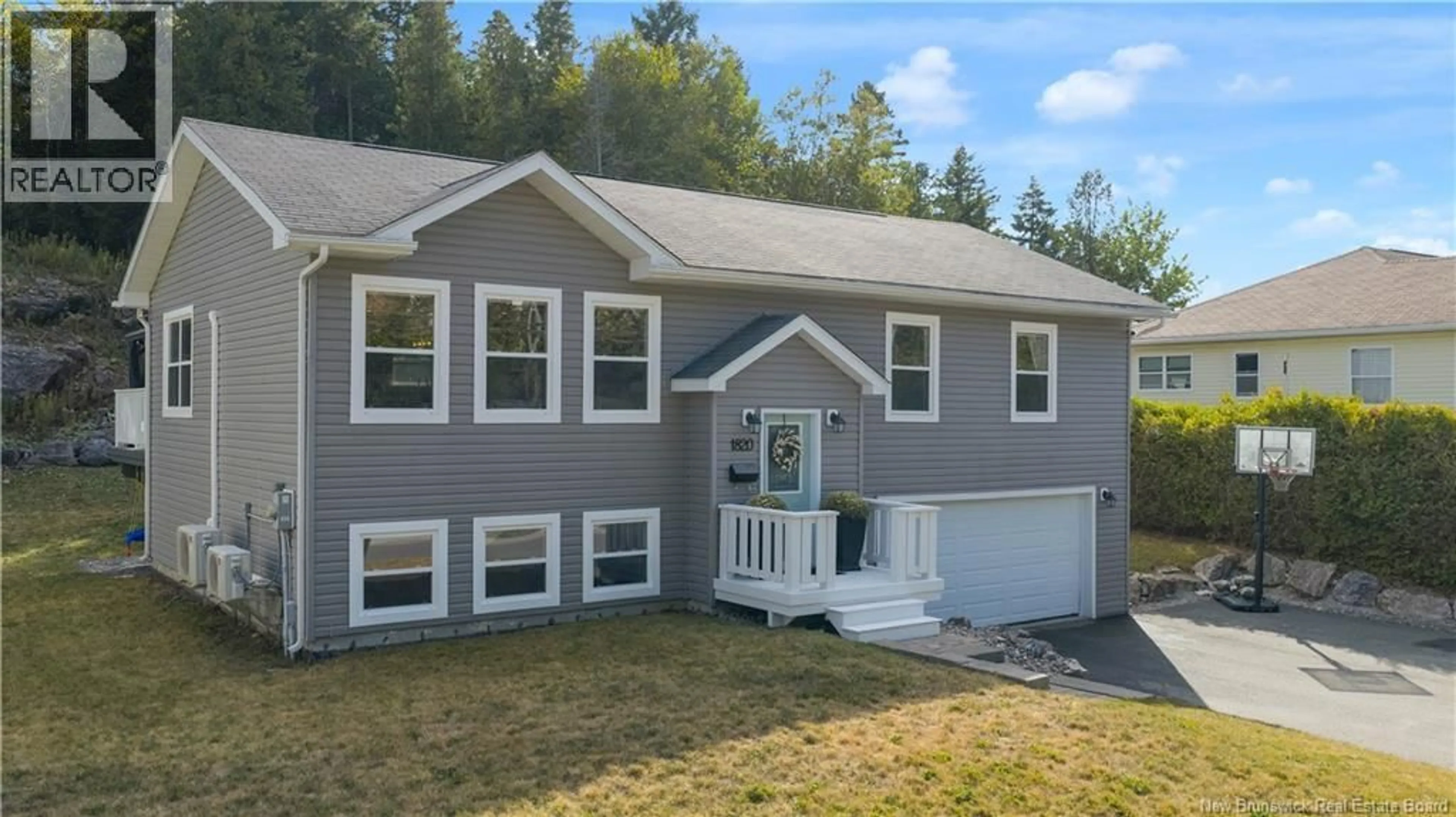 Home with vinyl exterior material, street for 1820 SANDY POINT ROAD, Saint John New Brunswick E2K5E9