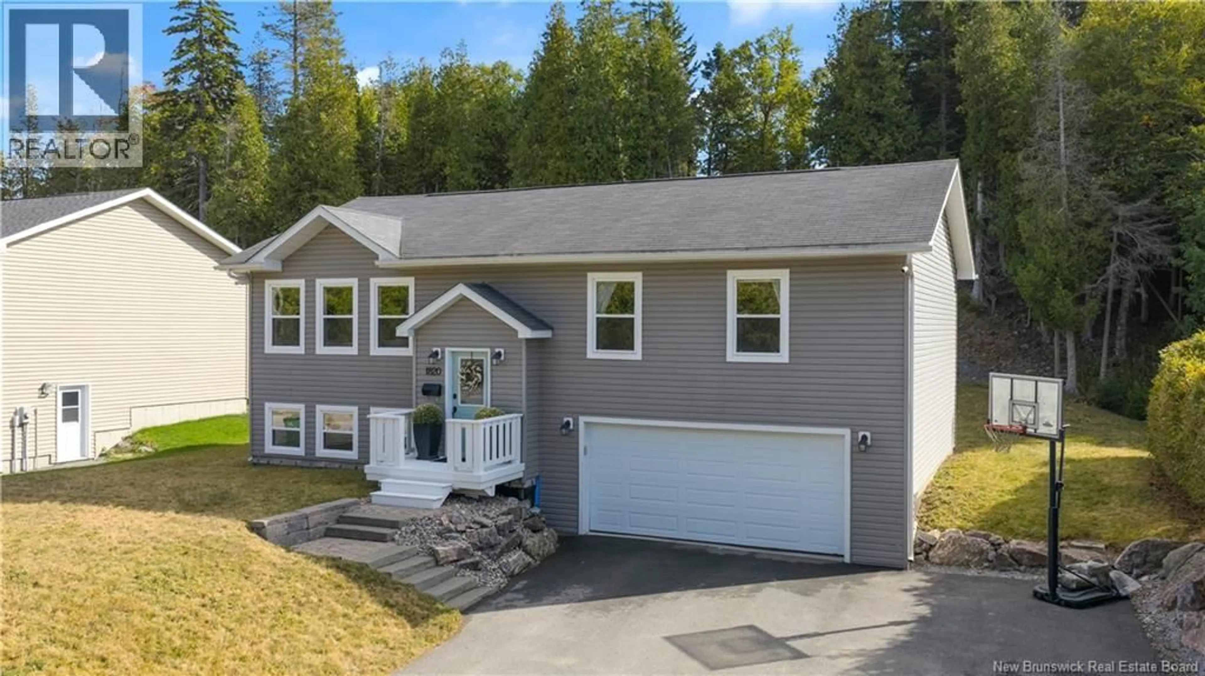 Home with vinyl exterior material, street for 1820 SANDY POINT ROAD, Saint John New Brunswick E2K5E9