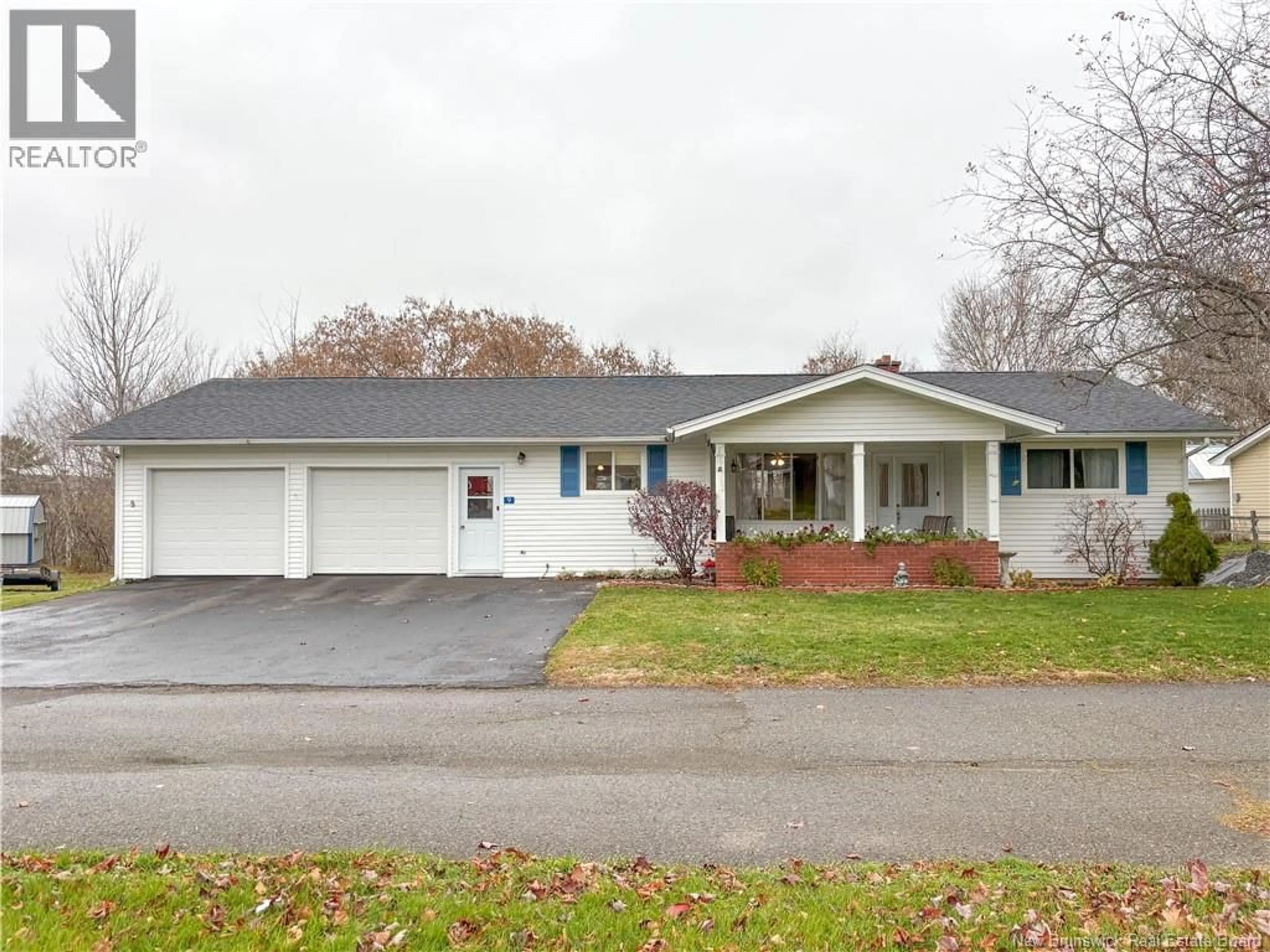 Home with vinyl exterior material, street for 9 CRESCENT GARDENS, Hartland New Brunswick E7P1L9