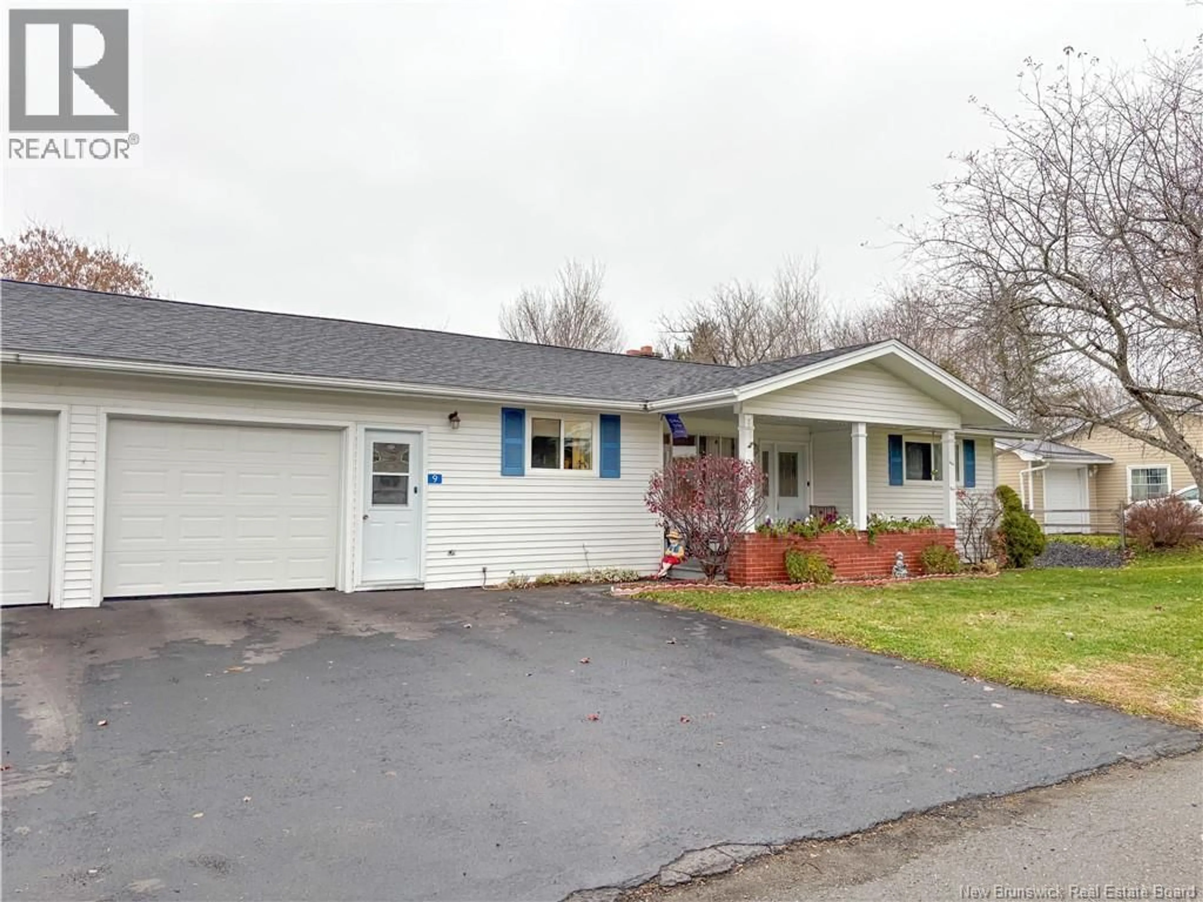 Home with vinyl exterior material, street for 9 CRESCENT GARDENS, Hartland New Brunswick E7P1L9