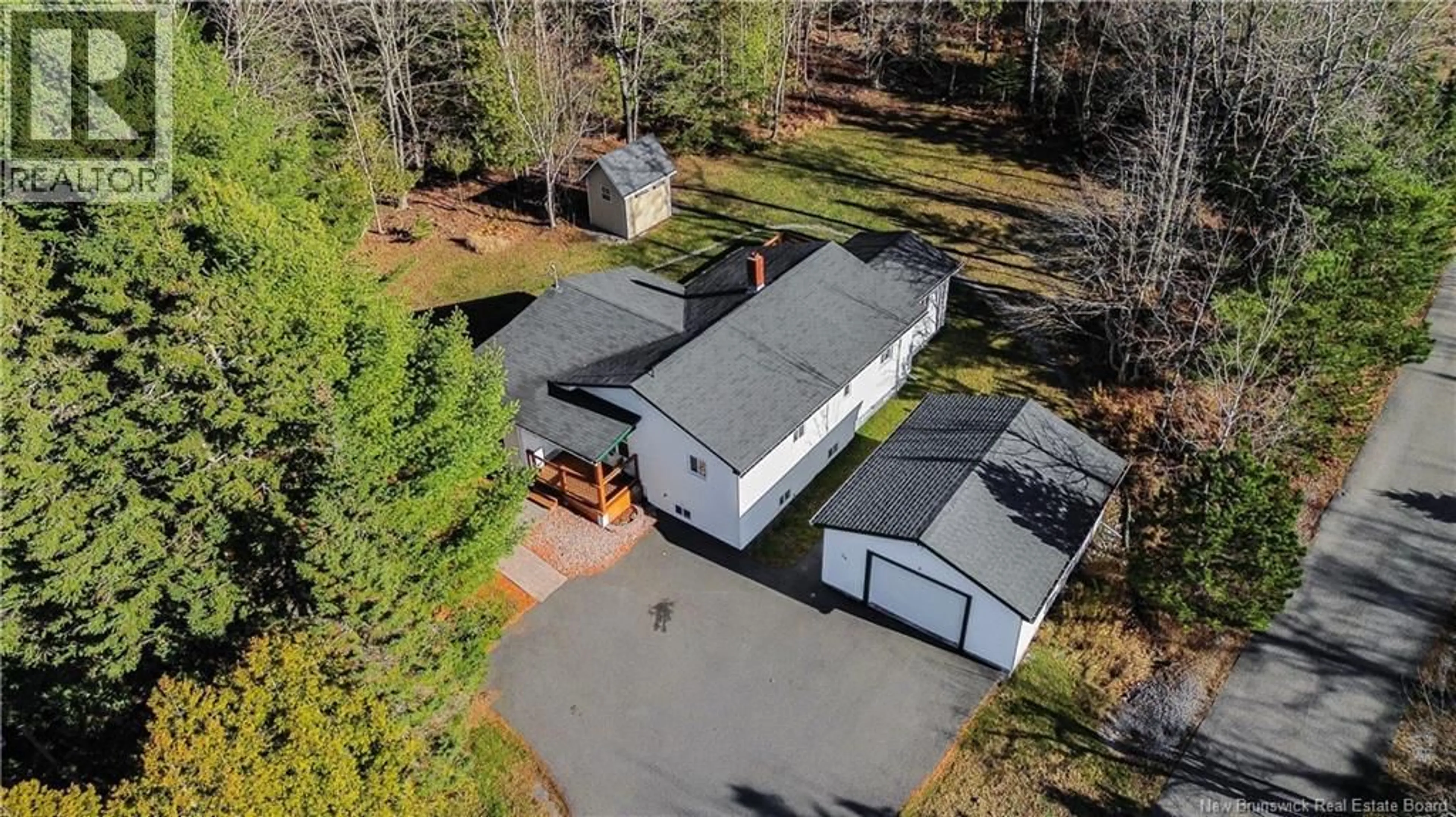 A pic from outside/outdoor area/front of a property/back of a property/a pic from drone, street for 74 VINCENT ROAD, Quispamsis New Brunswick E2E1V4