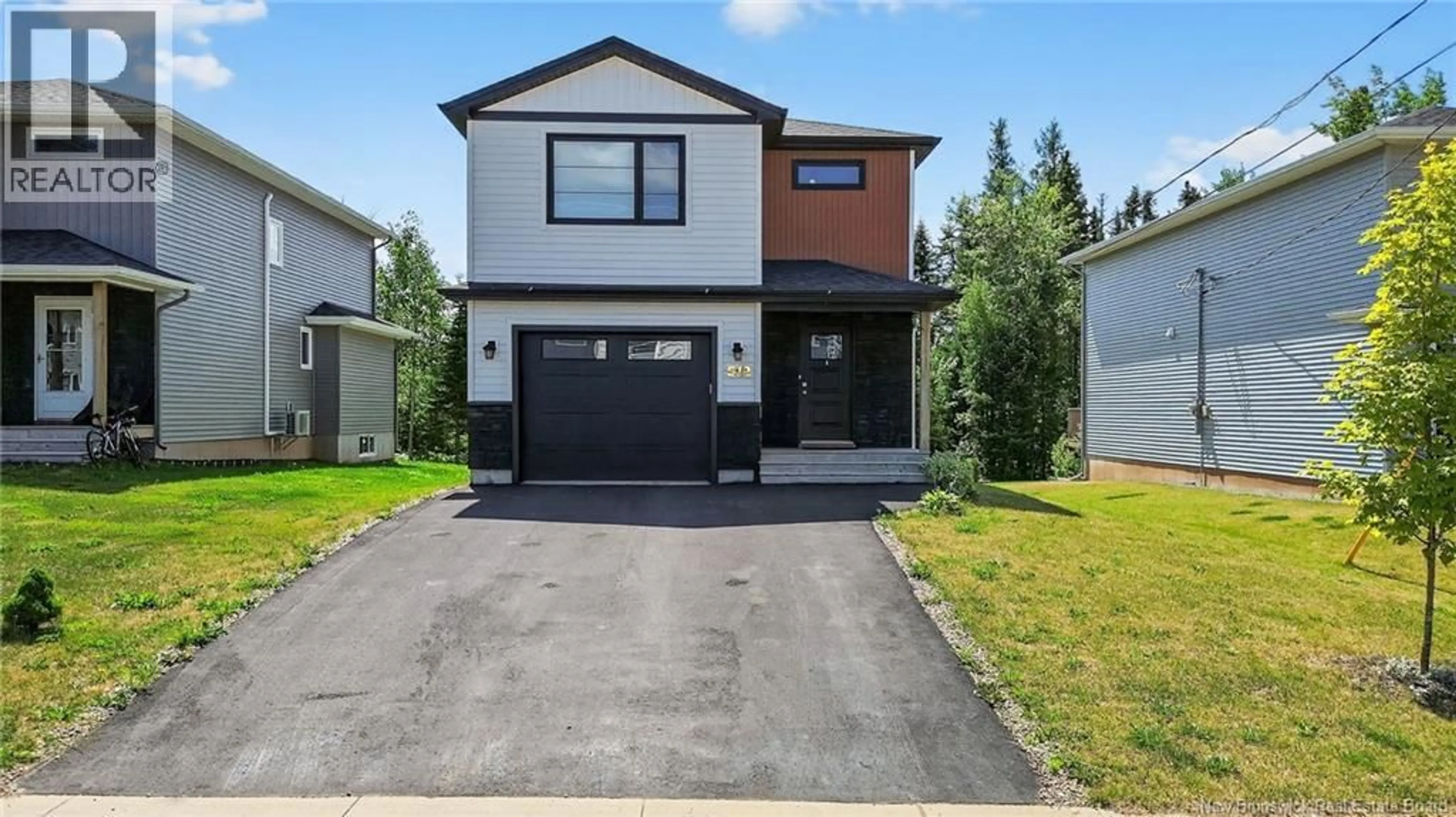 Home with brick exterior material, street for 512 MAPLEHURST DRIVE, Moncton New Brunswick E1G6E2