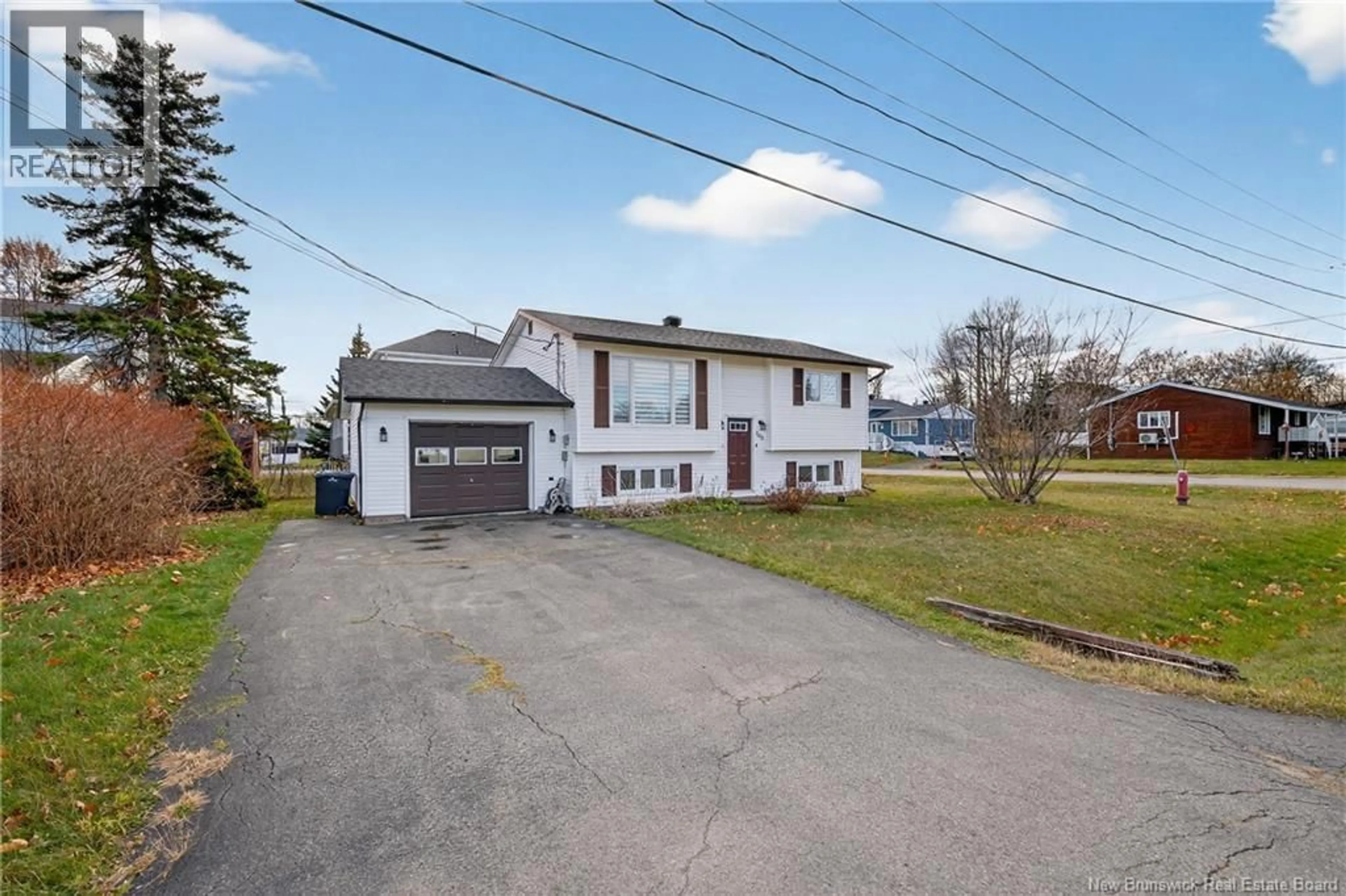 A pic from outside/outdoor area/front of a property/back of a property/a pic from drone, street for 595 ST SIMON, Bathurst New Brunswick E2A3L7