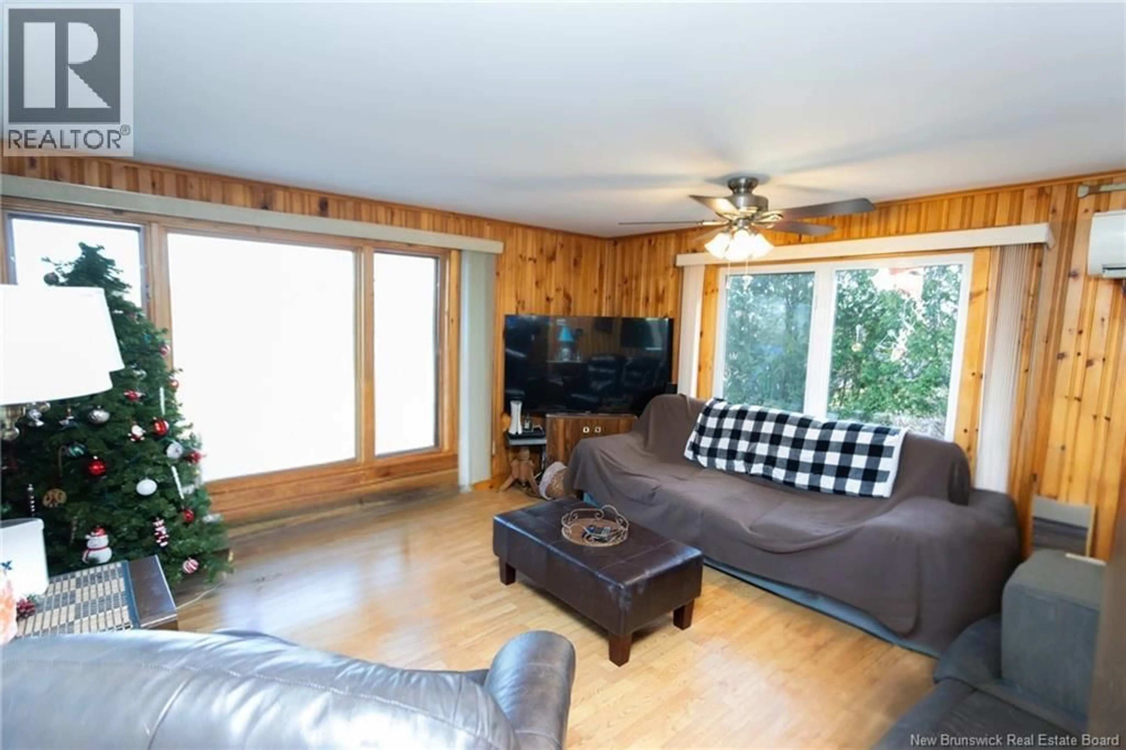 Living room with furniture, wood/laminate floor for 5220 ROUTE 102, Hampstead New Brunswick E5M2B6