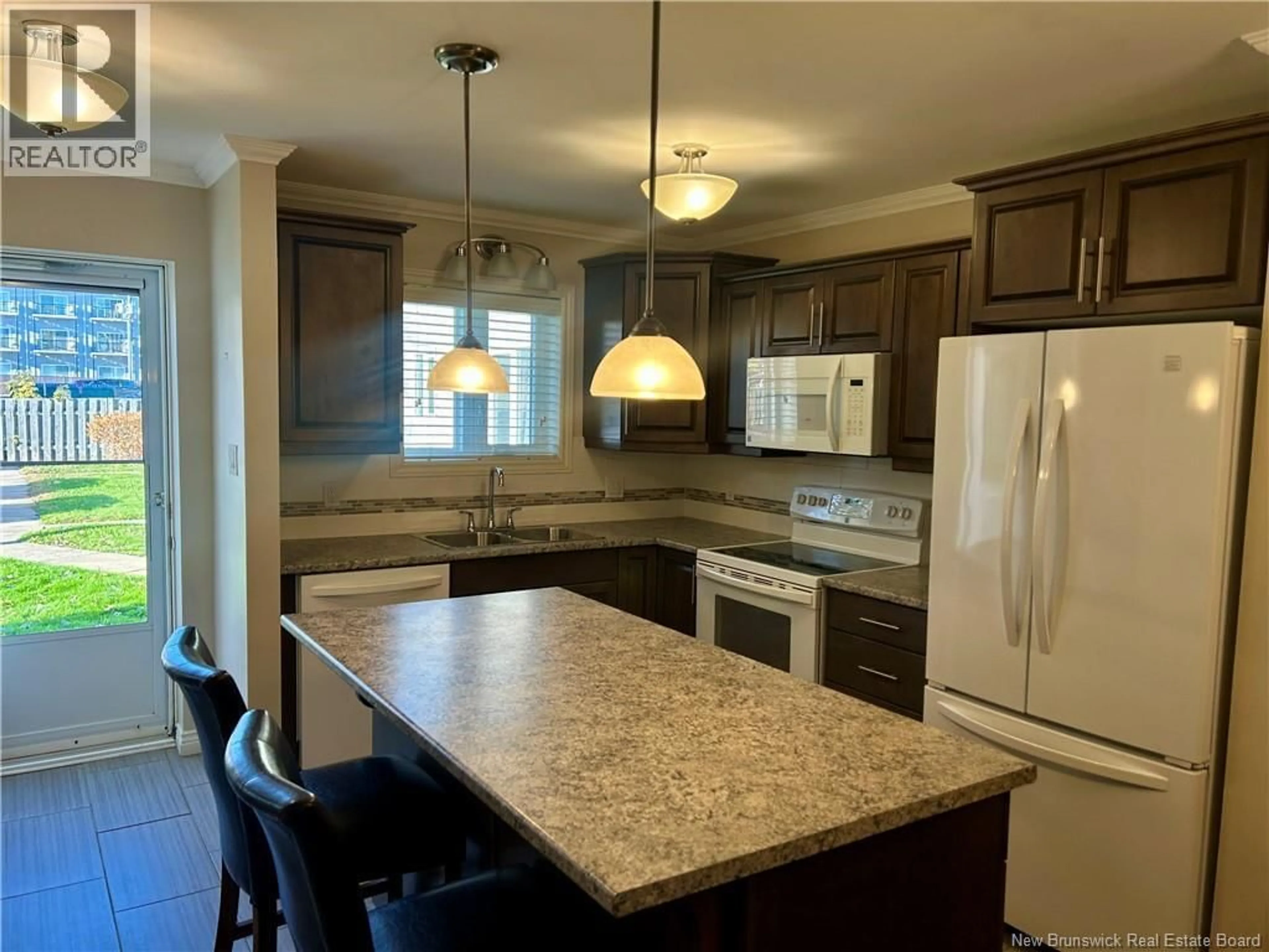 Open concept kitchen, ceramic/tile floor for 8 - 331 MCLAUGHLIN DRIVE, Moncton New Brunswick E1A4R3