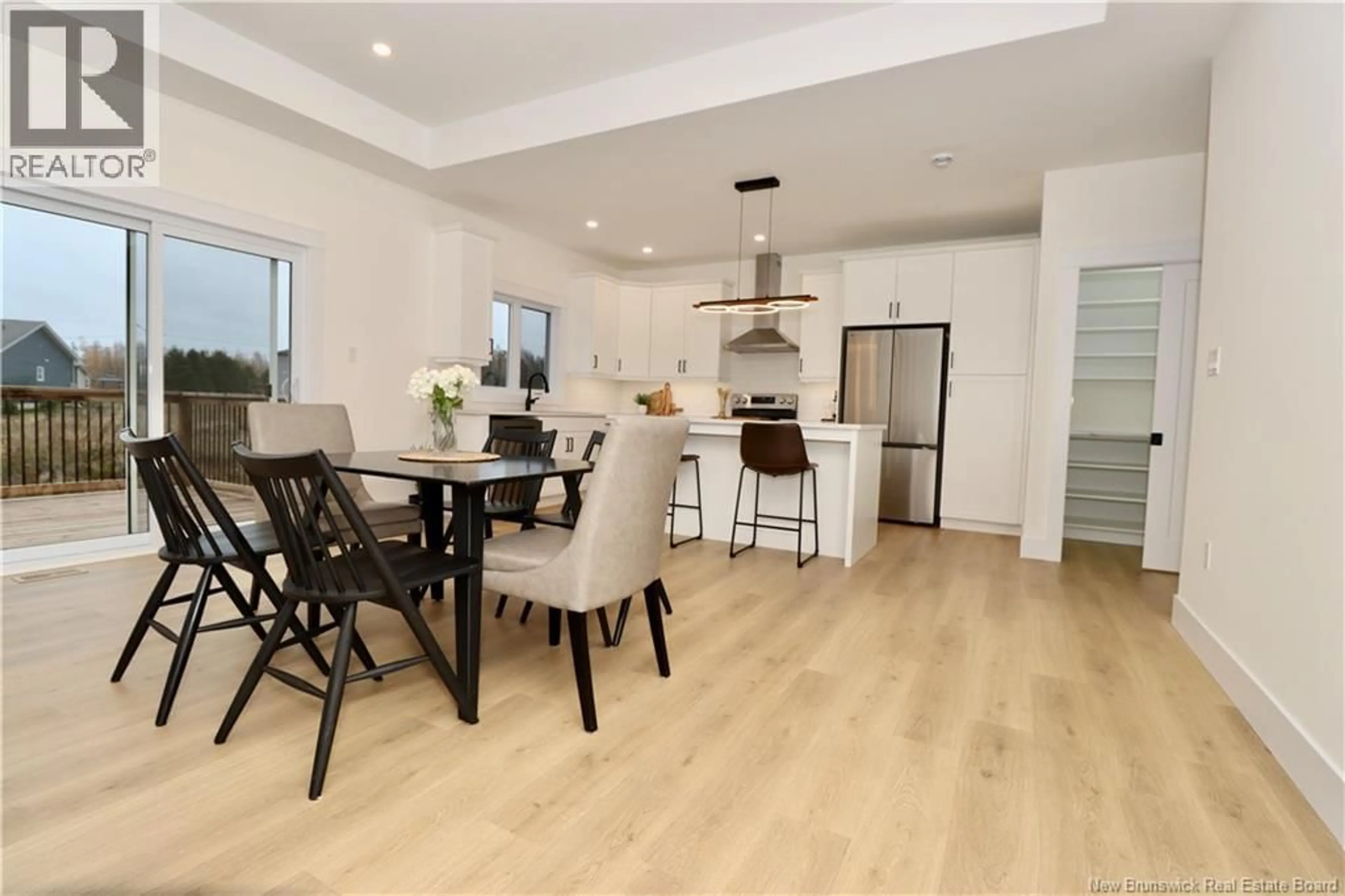 Open concept kitchen, wood/laminate floor for 131 CARRINGTON DRIVE, Riverview New Brunswick E1B5B8