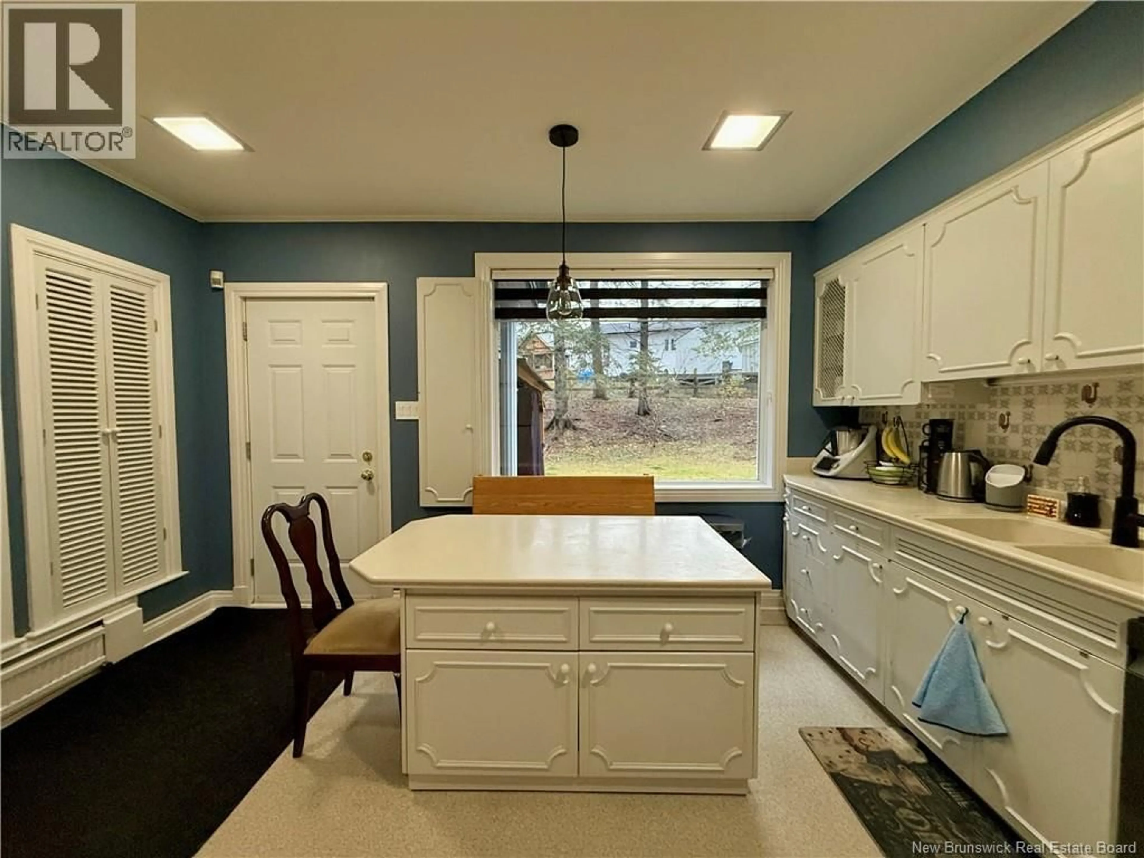 Open concept kitchen, ceramic/tile floor for 28 LAWSON STREET, Edmundston New Brunswick E3V1Z4