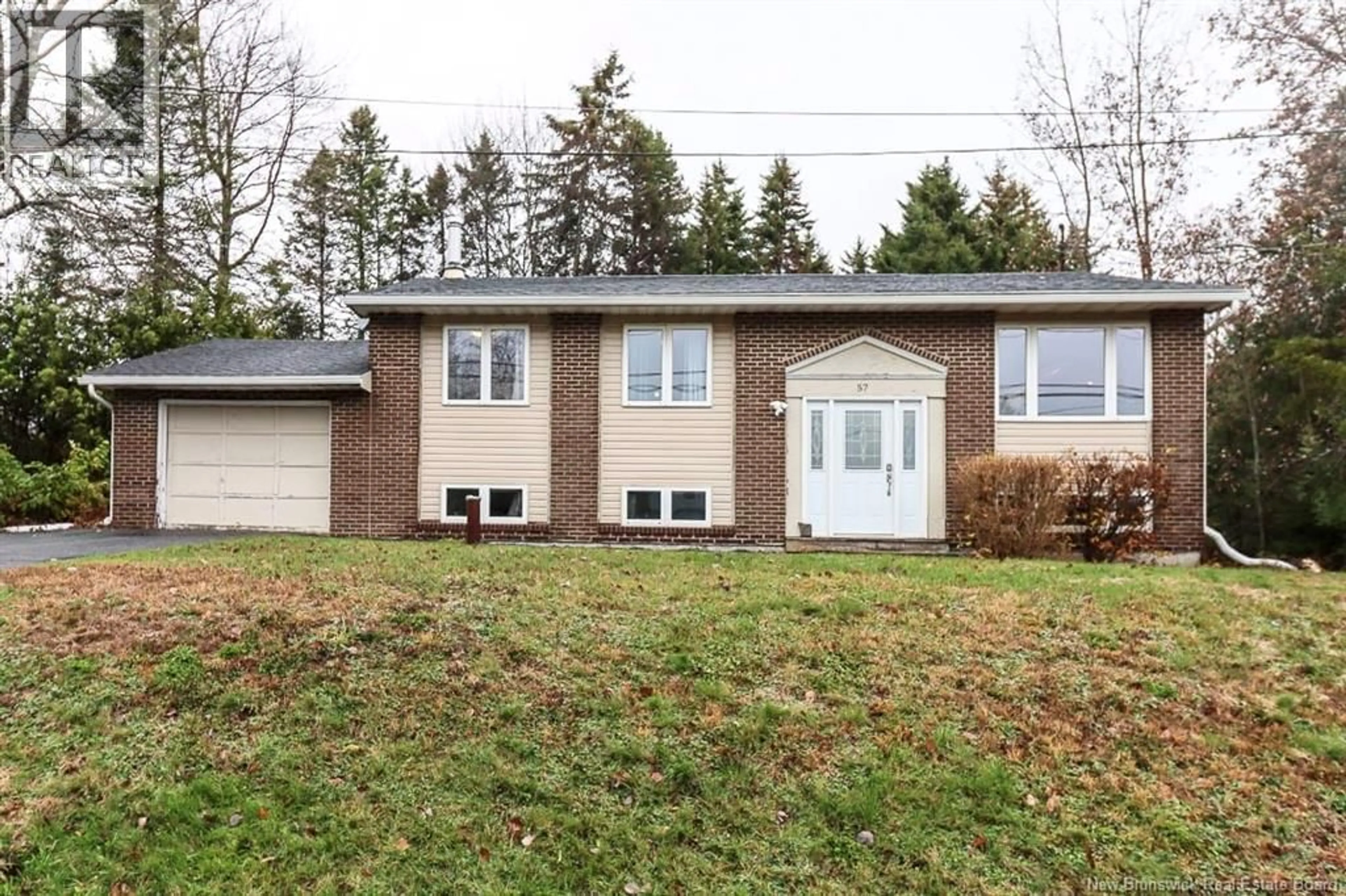 Home with vinyl exterior material, street for 57 MONARCH DRIVE, Quispamsis New Brunswick E2G1P2