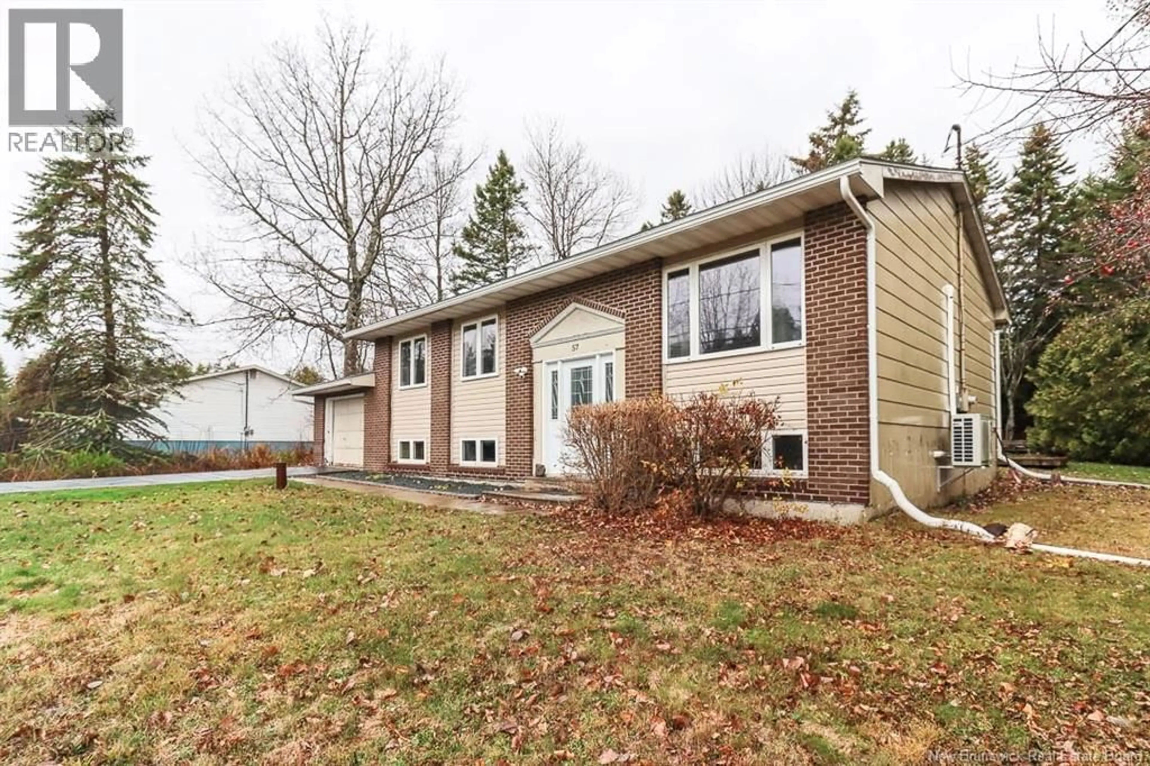 Home with vinyl exterior material, street for 57 MONARCH DRIVE, Quispamsis New Brunswick E2G1P2