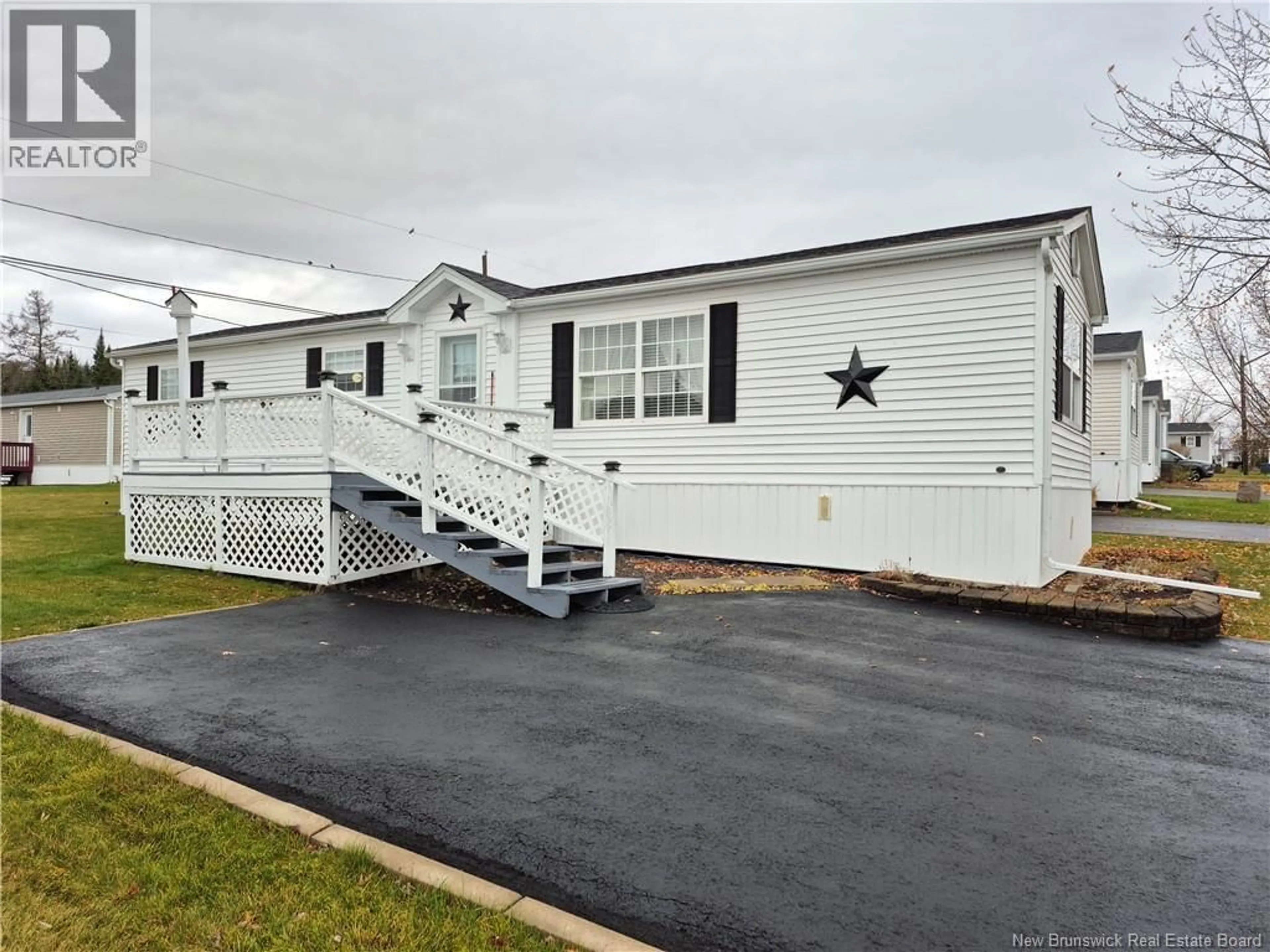 Home with vinyl exterior material, street for 28 DOUGNORTH STREET, Fredericton New Brunswick E3G0H7