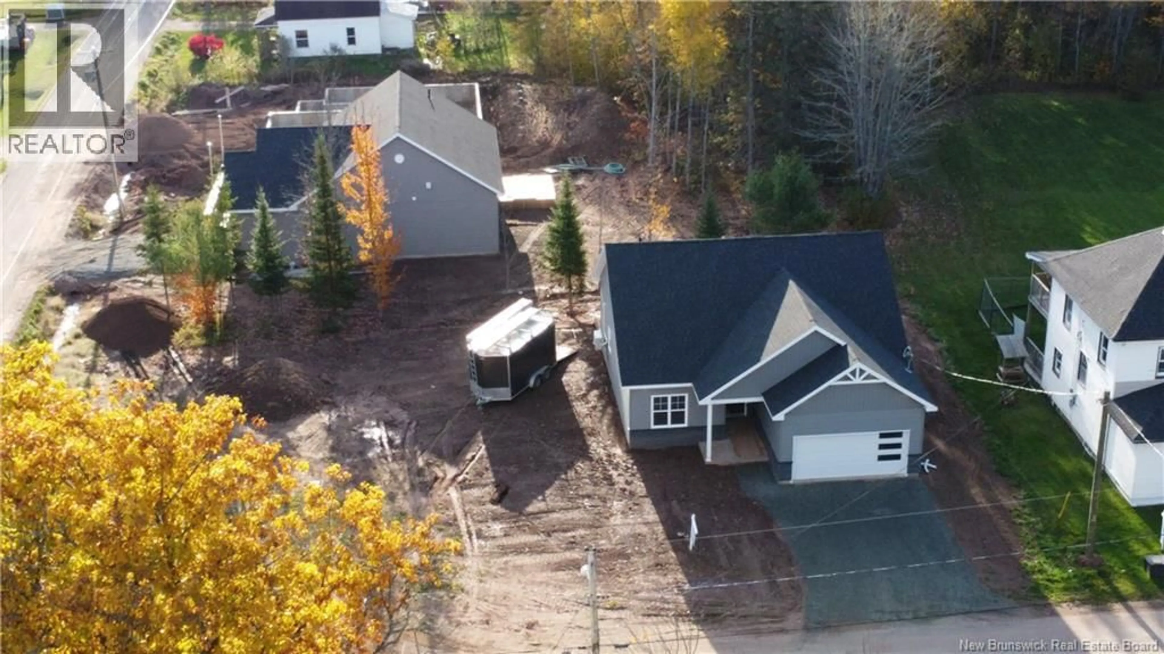 A pic from outside/outdoor area/front of a property/back of a property/a pic from drone, street for 42 CONNOR STREET, Petitcodiac New Brunswick E4Z4G2