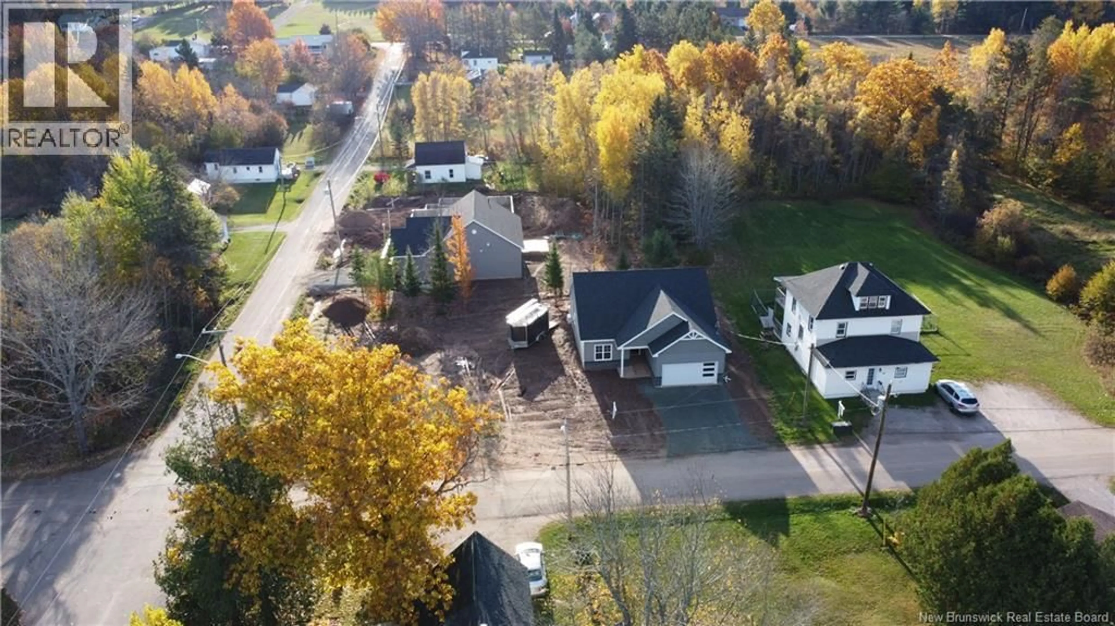 A pic from outside/outdoor area/front of a property/back of a property/a pic from drone, unknown for 42 CONNOR STREET, Petitcodiac New Brunswick E4Z4G2