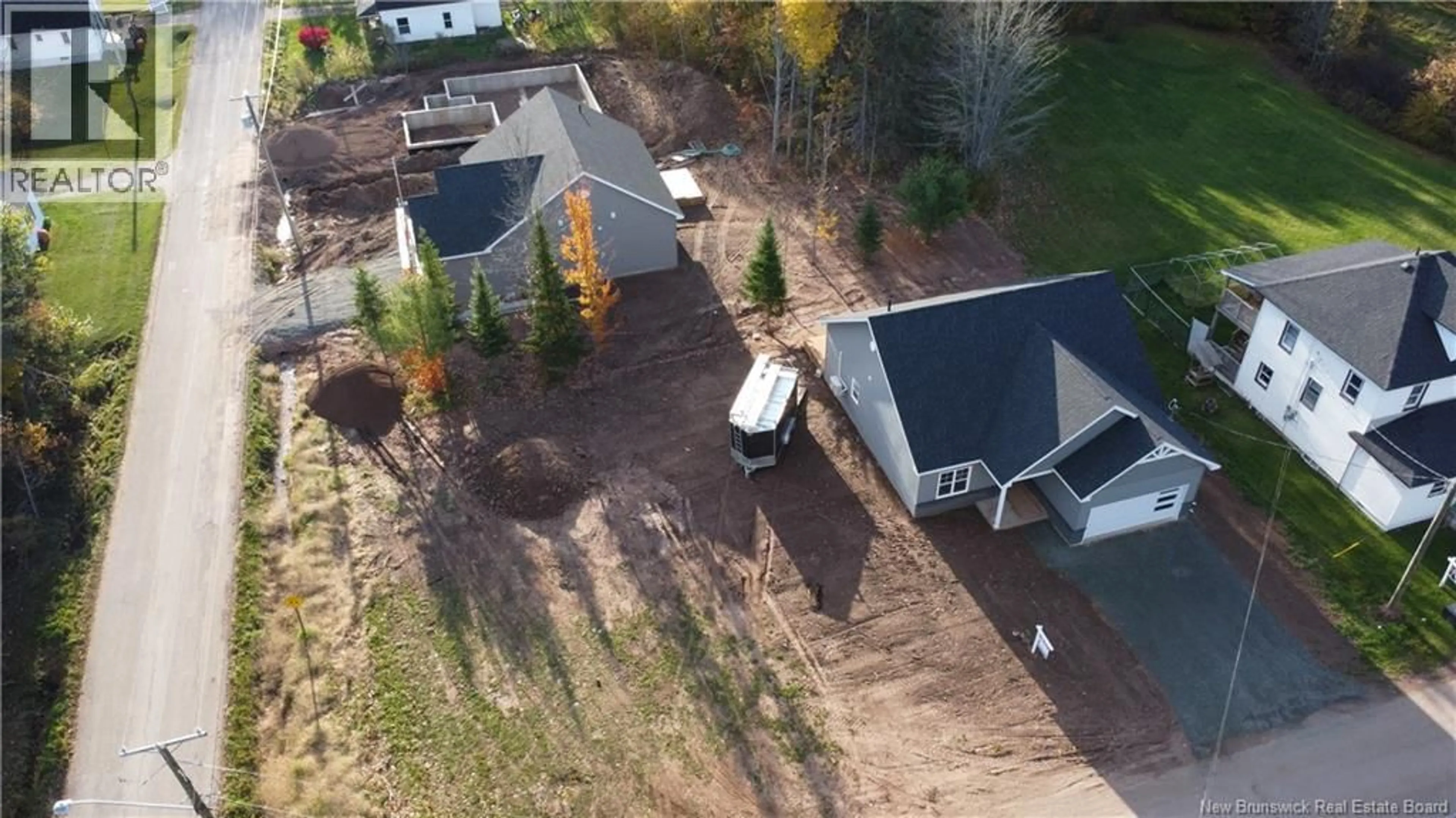 A pic from outside/outdoor area/front of a property/back of a property/a pic from drone, street for 42 CONNOR STREET, Petitcodiac New Brunswick E4Z4G2
