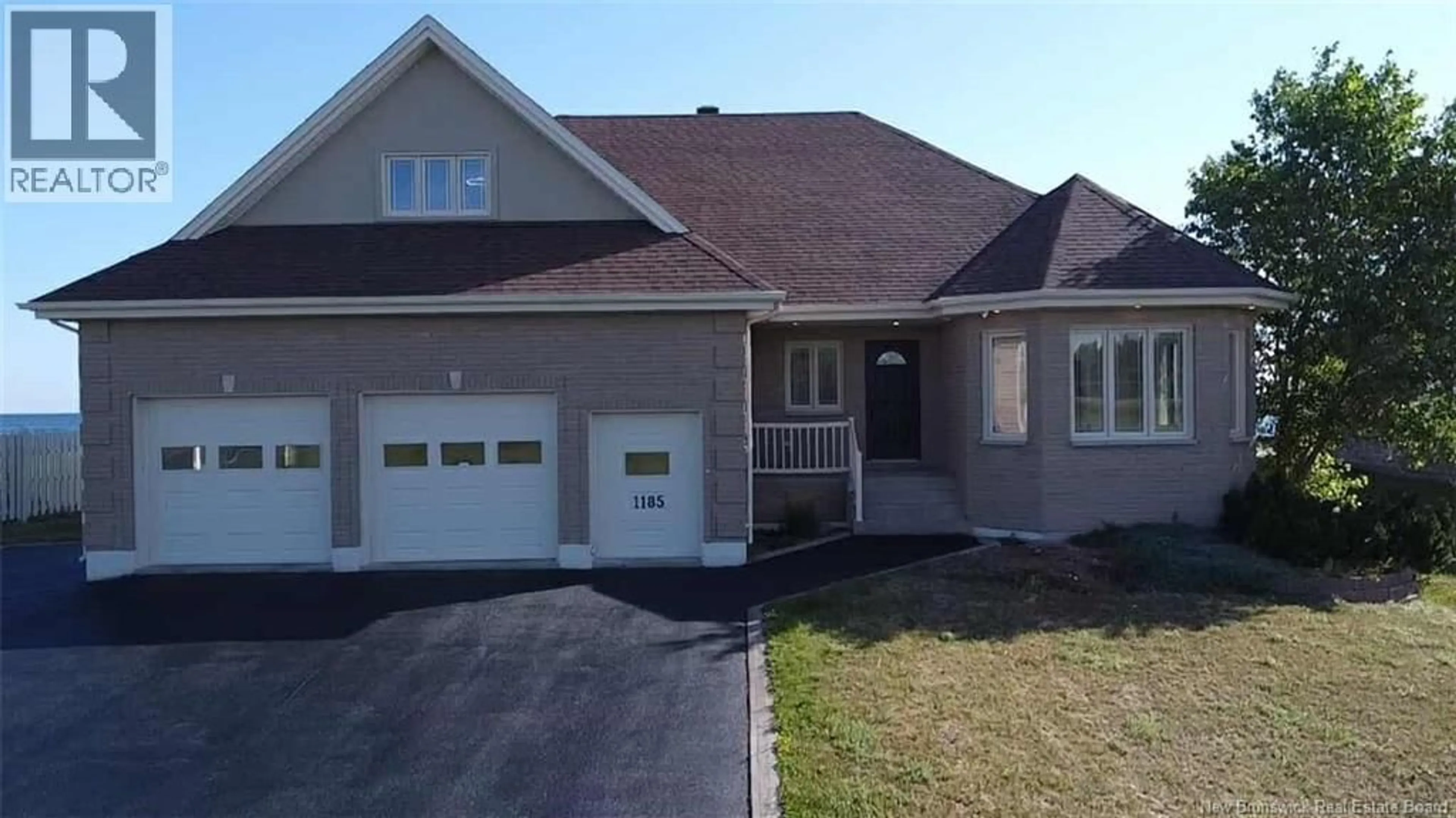 Home with vinyl exterior material, street for 1185 JACQUES CARTIER STREET, Beresford New Brunswick E8K1A6