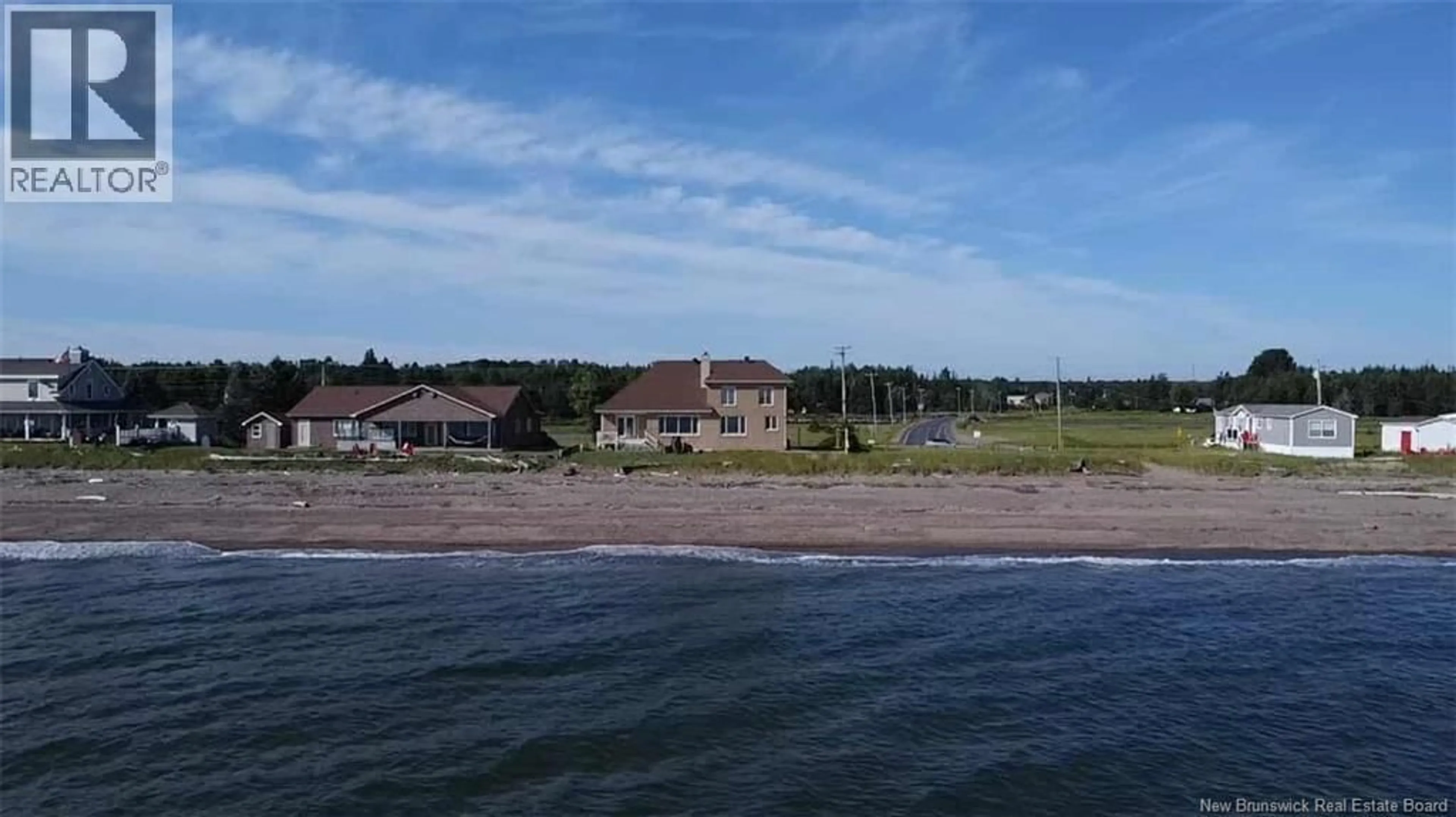 A pic from outside/outdoor area/front of a property/back of a property/a pic from drone, water/lake/river/ocean view for 1185 JACQUES CARTIER STREET, Beresford New Brunswick E8K1A6