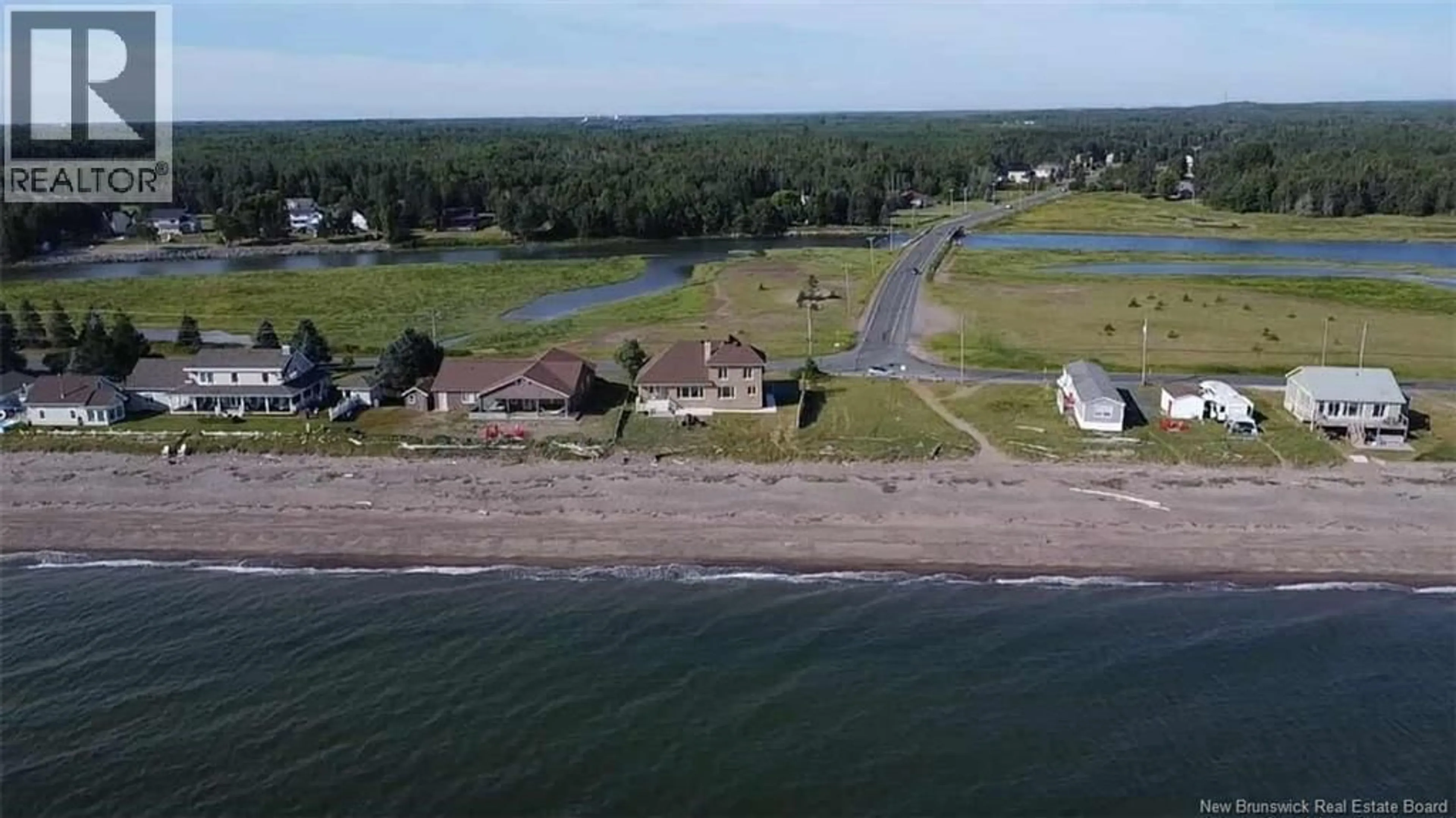 A pic from outside/outdoor area/front of a property/back of a property/a pic from drone, water/lake/river/ocean view for 1185 JACQUES CARTIER STREET, Beresford New Brunswick E8K1A6