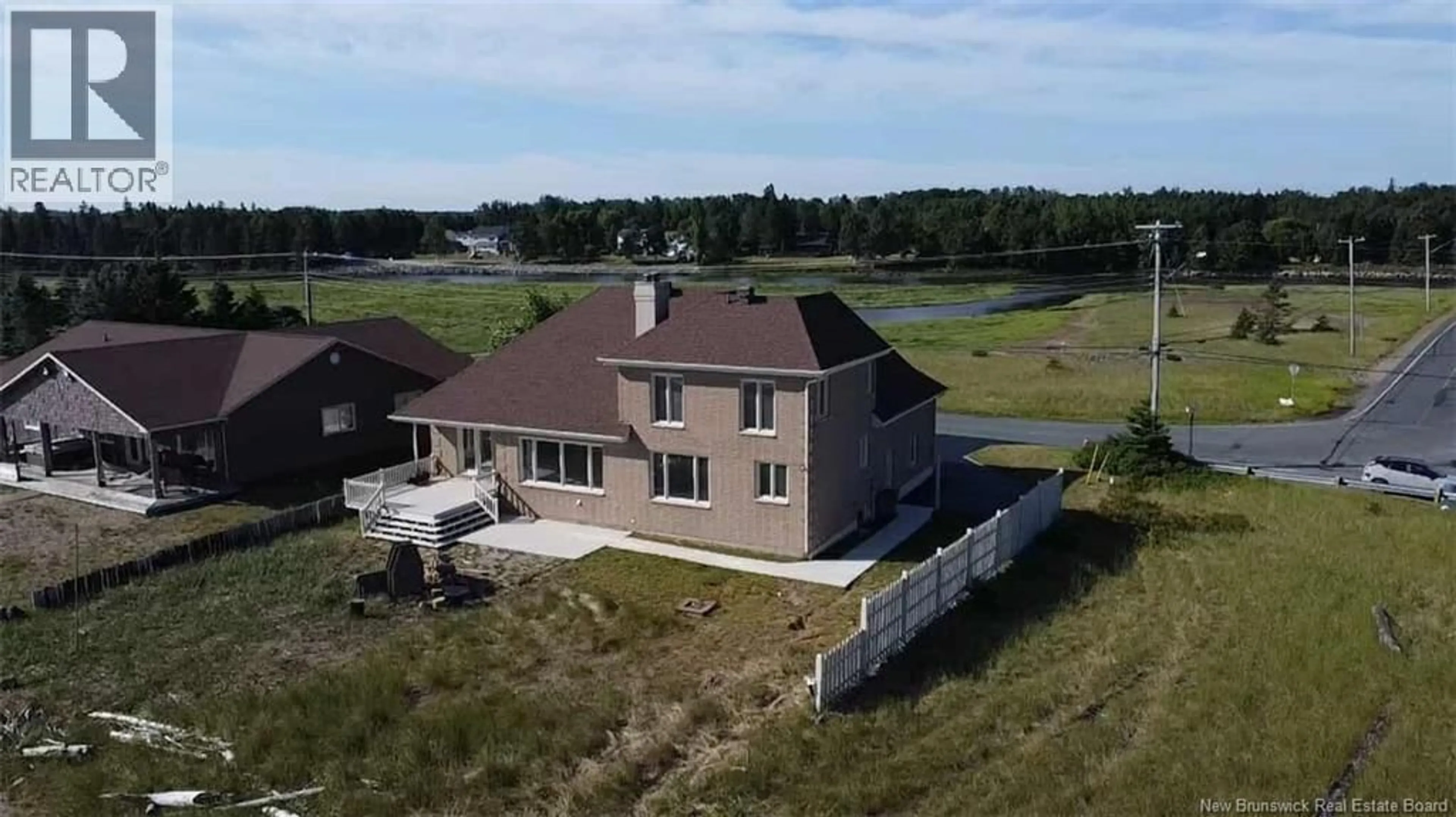 A pic from outside/outdoor area/front of a property/back of a property/a pic from drone, building for 1185 JACQUES CARTIER STREET, Beresford New Brunswick E8K1A6