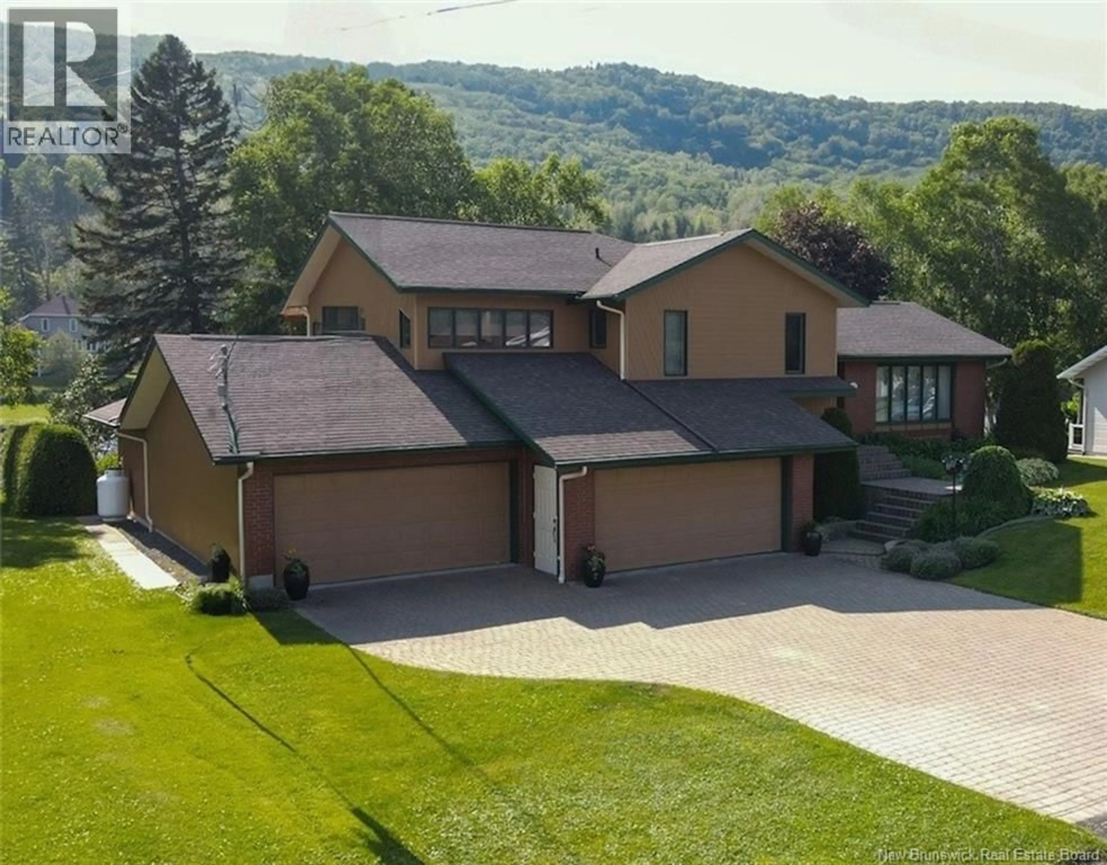 A pic from outside/outdoor area/front of a property/back of a property/a pic from drone, mountain view for 75 LEBLOND STREET, Edmundston New Brunswick E3V4K9