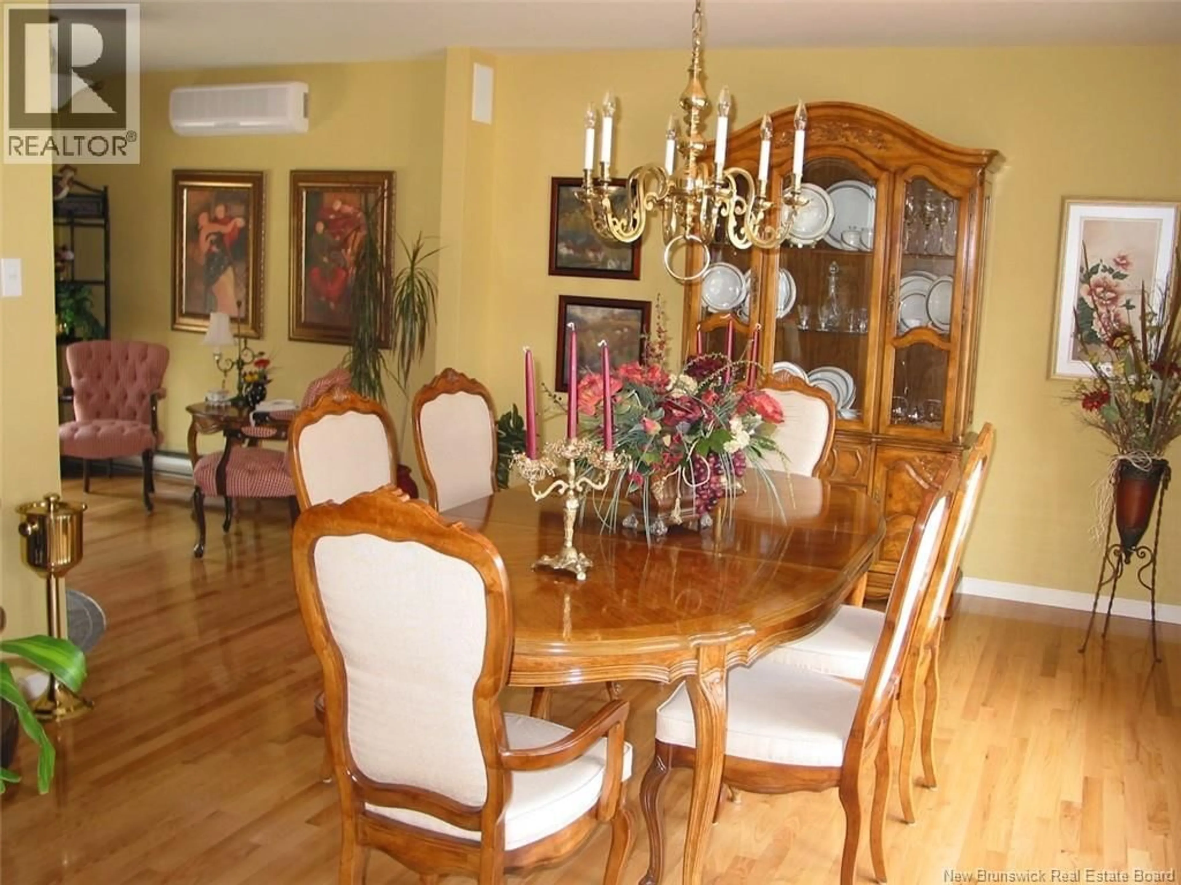 Dining room, wood/laminate floor for 75 LEBLOND STREET, Edmundston New Brunswick E3V4K9