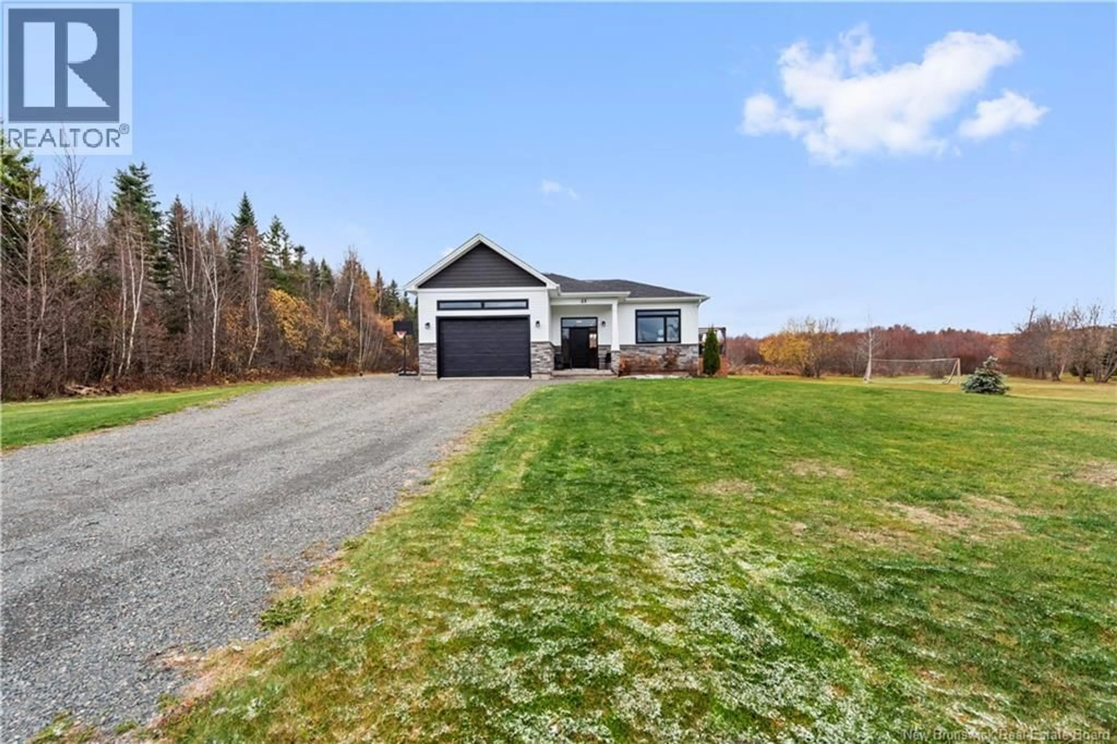 A pic from outside/outdoor area/front of a property/back of a property/a pic from drone, water/lake/river/ocean view for 23 FAWN CRESCENT, Lutes Mountain New Brunswick E1G6C7