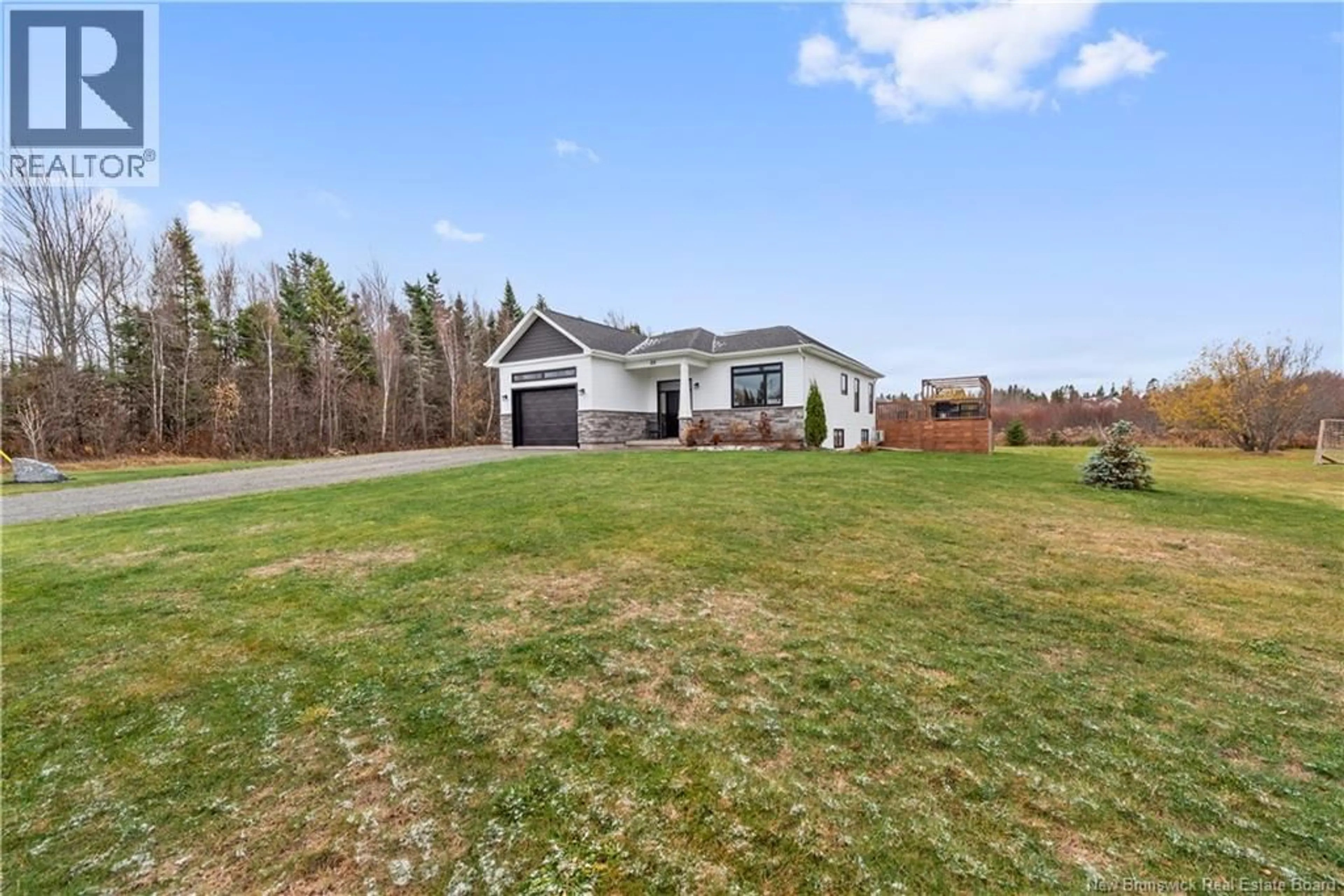 A pic from outside/outdoor area/front of a property/back of a property/a pic from drone, unknown for 23 FAWN CRESCENT, Lutes Mountain New Brunswick E1G6C7