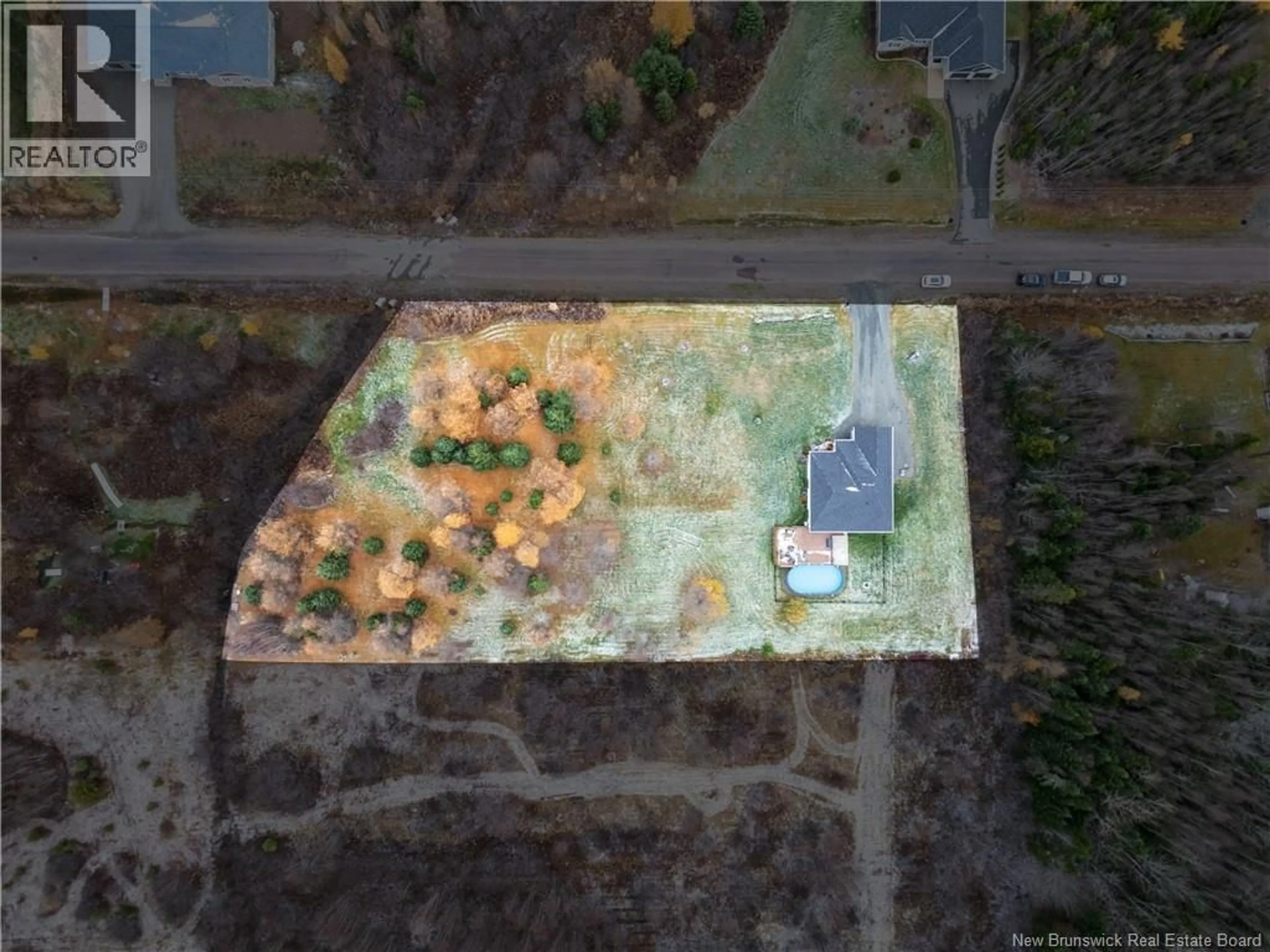 A pic from outside/outdoor area/front of a property/back of a property/a pic from drone, unknown for 23 FAWN CRESCENT, Lutes Mountain New Brunswick E1G6C7