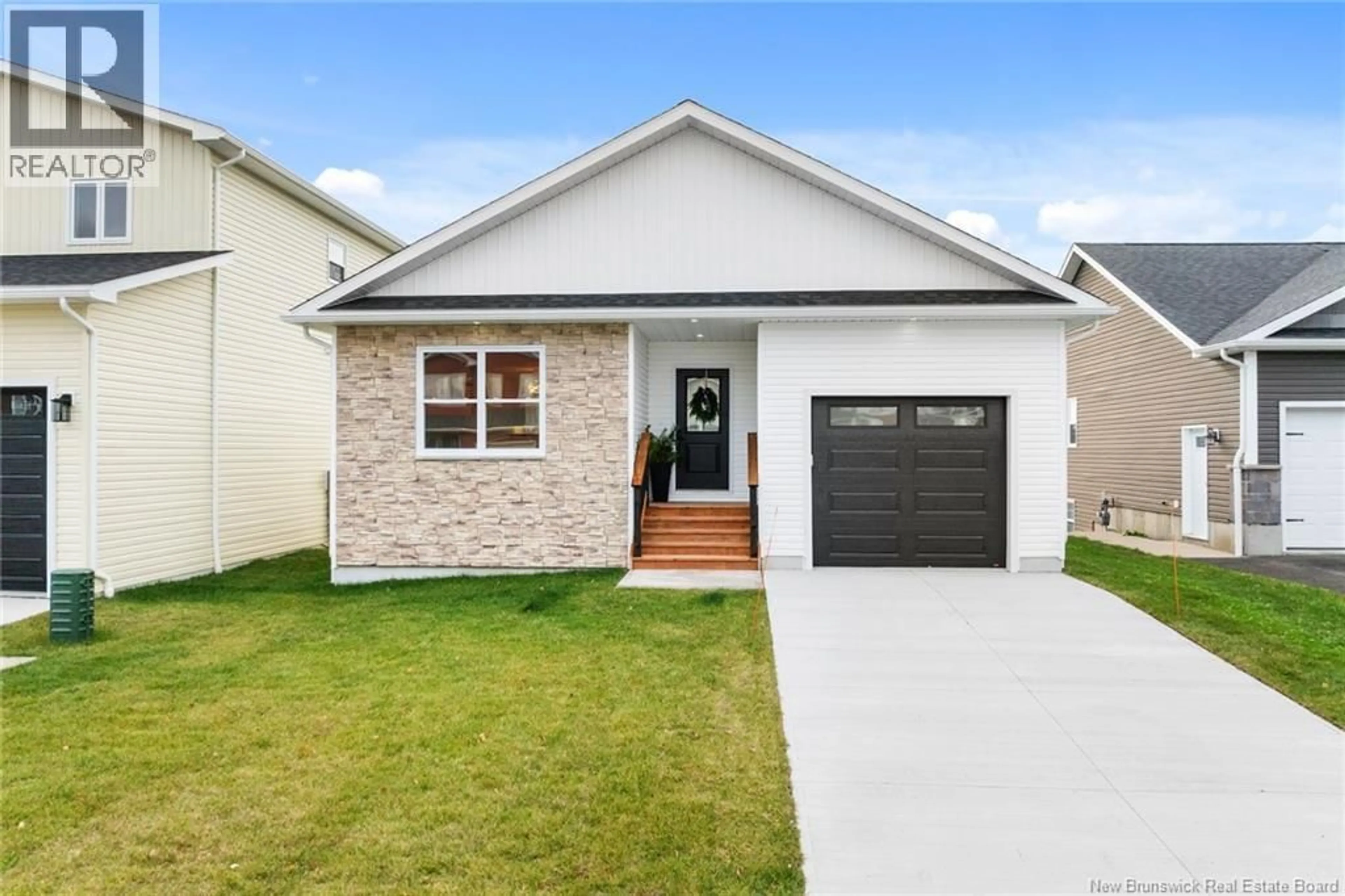 Home with vinyl exterior material, street for 12 BRIAR BROOK PLACE, Fredericton New Brunswick E3A3N1