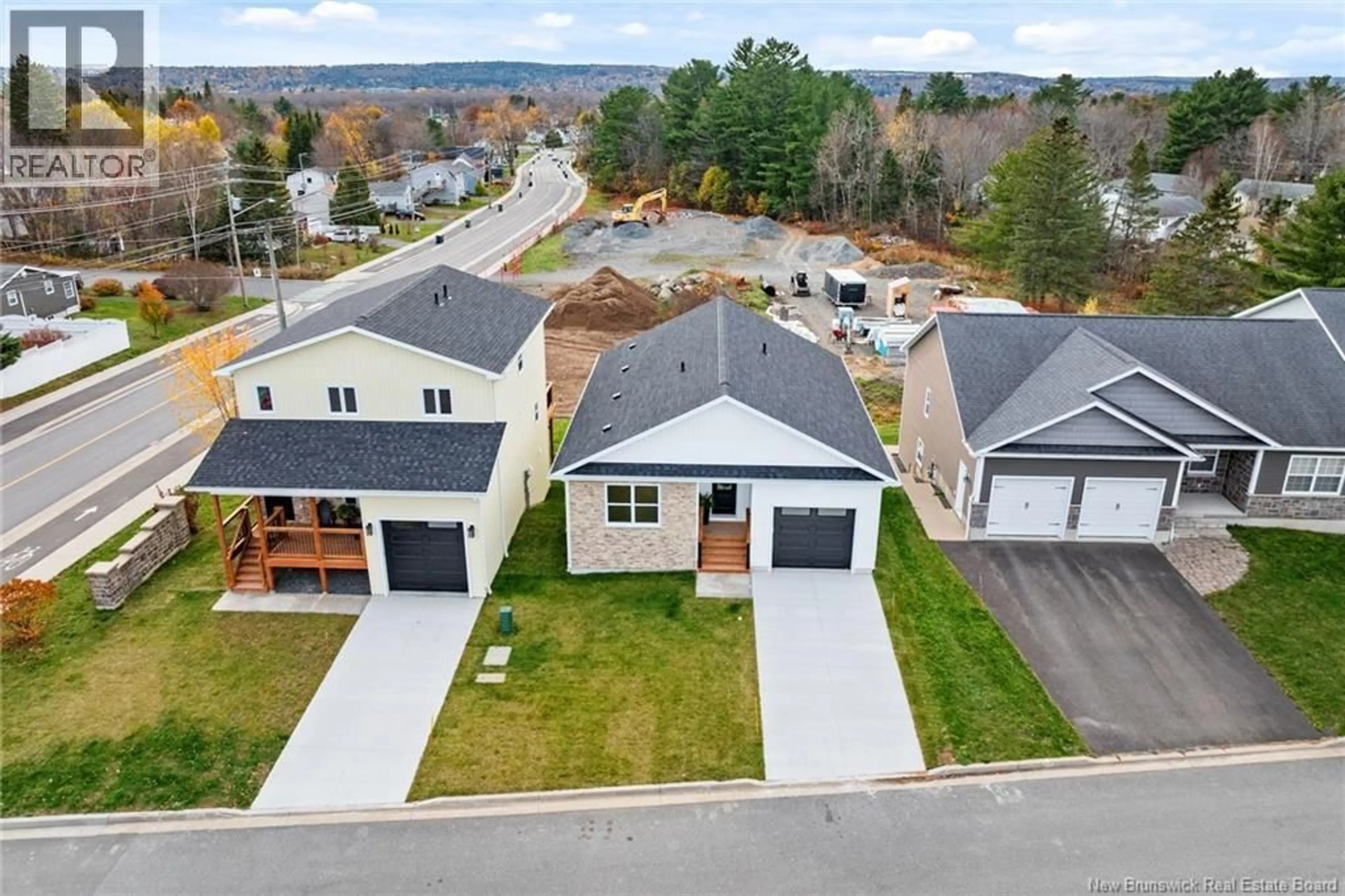 A pic from outside/outdoor area/front of a property/back of a property/a pic from drone, street for 12 BRIAR BROOK PLACE, Fredericton New Brunswick E3A3N1