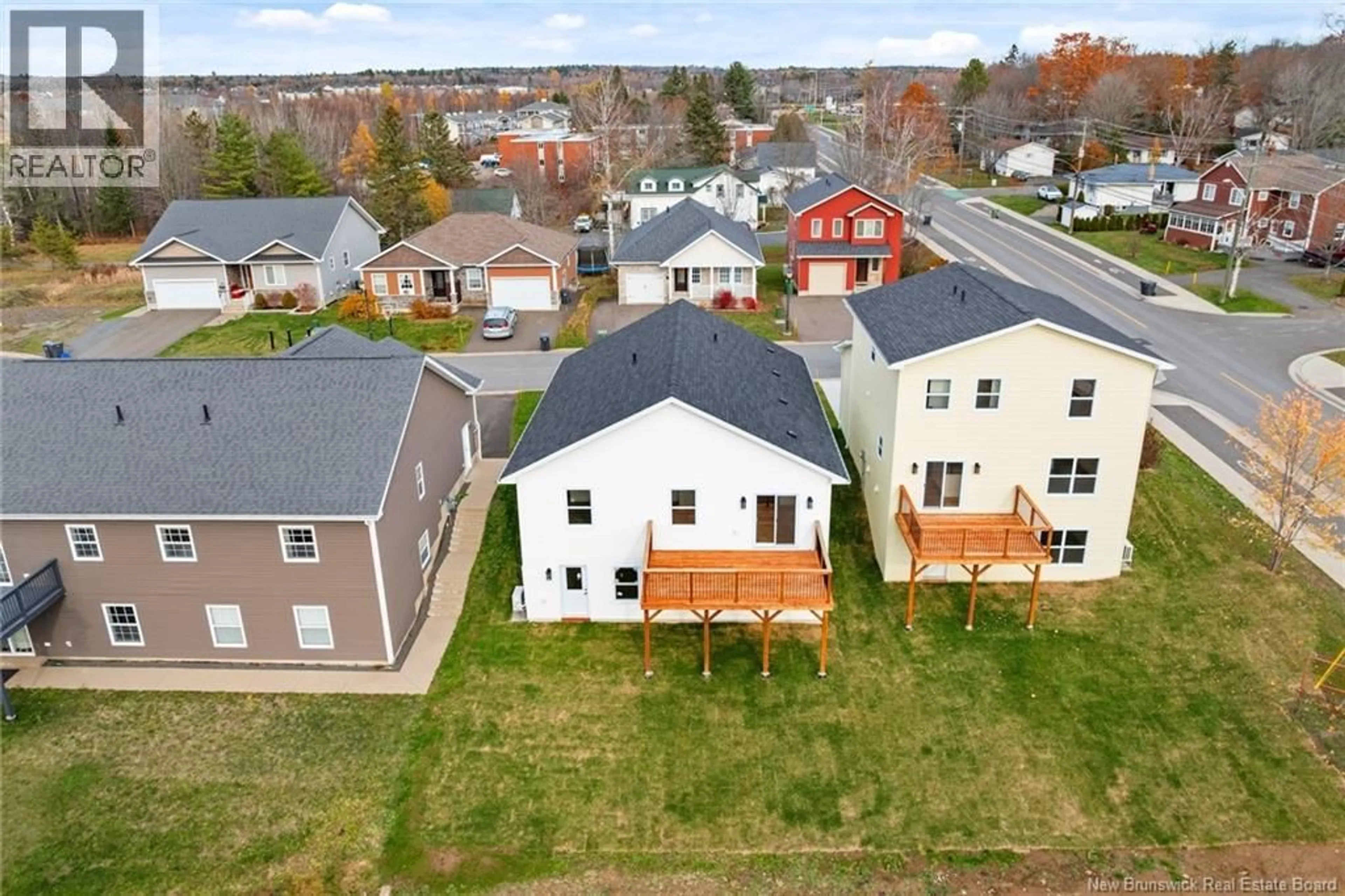 A pic from outside/outdoor area/front of a property/back of a property/a pic from drone, street for 12 BRIAR BROOK PLACE, Fredericton New Brunswick E3A3N1