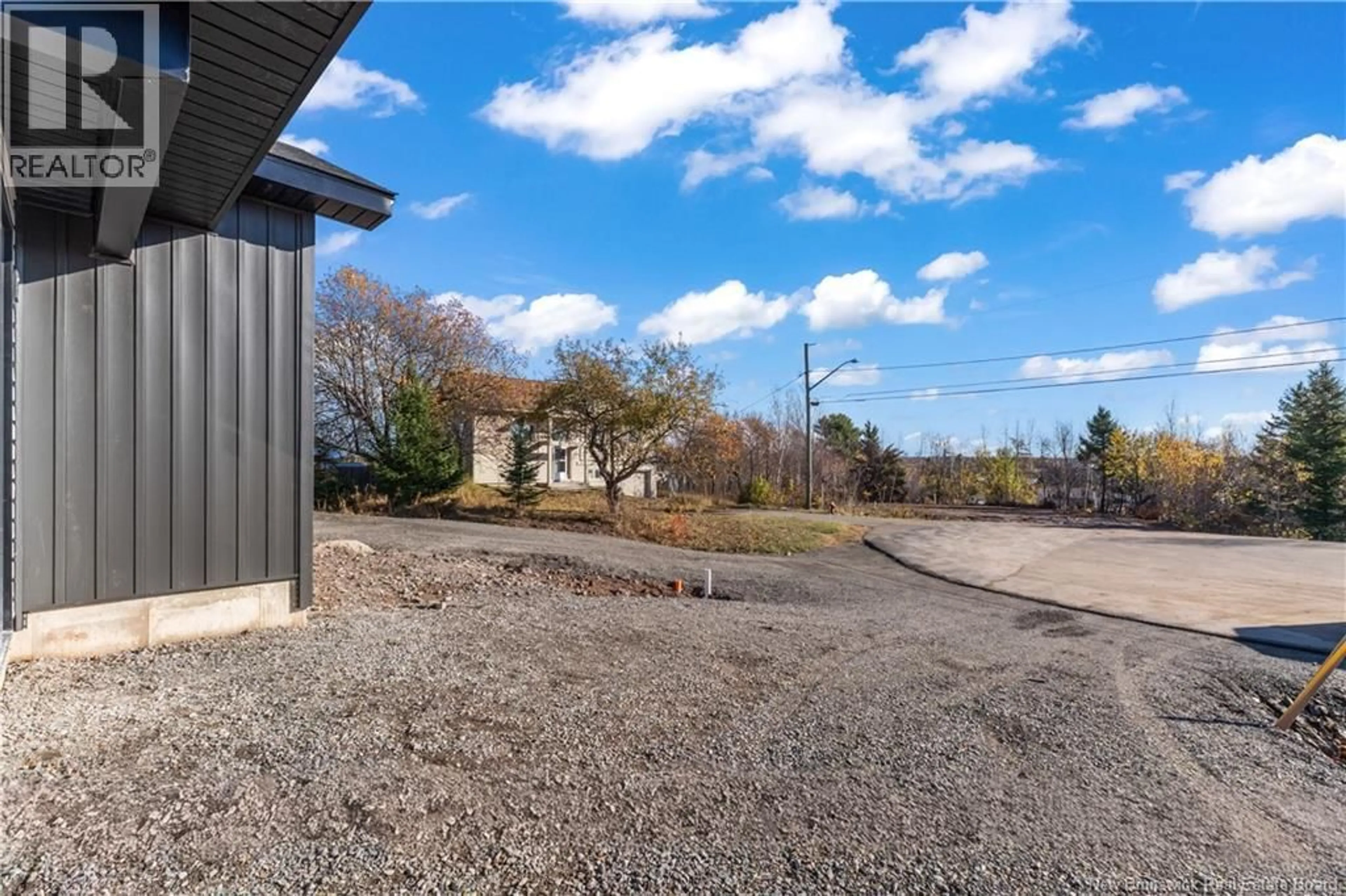 A pic from outside/outdoor area/front of a property/back of a property/a pic from drone, street for 46 HERON COURT, Bouctouche New Brunswick E4S0E3