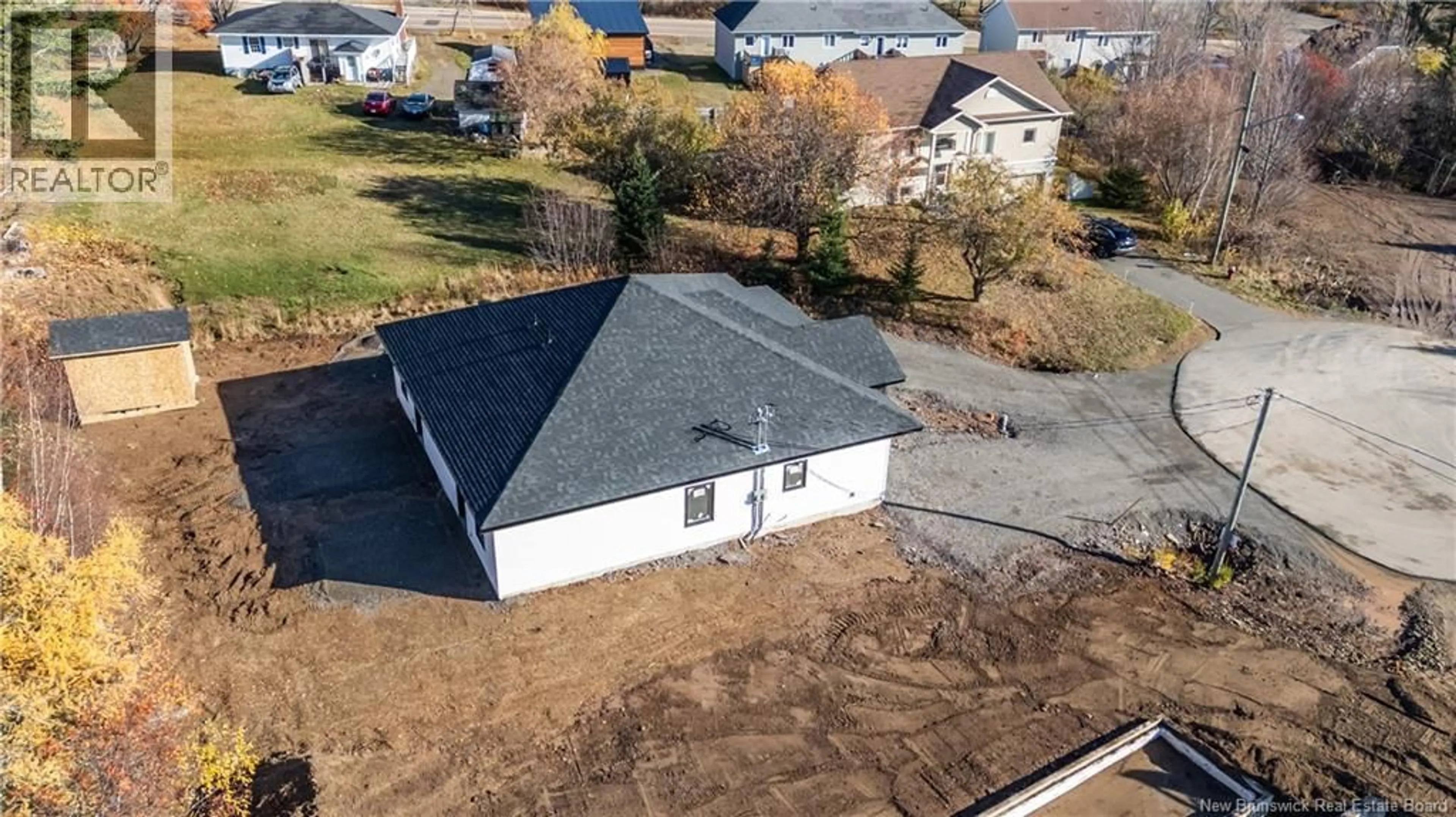 A pic from outside/outdoor area/front of a property/back of a property/a pic from drone, unknown for 46 HERON COURT, Bouctouche New Brunswick E4S0E3