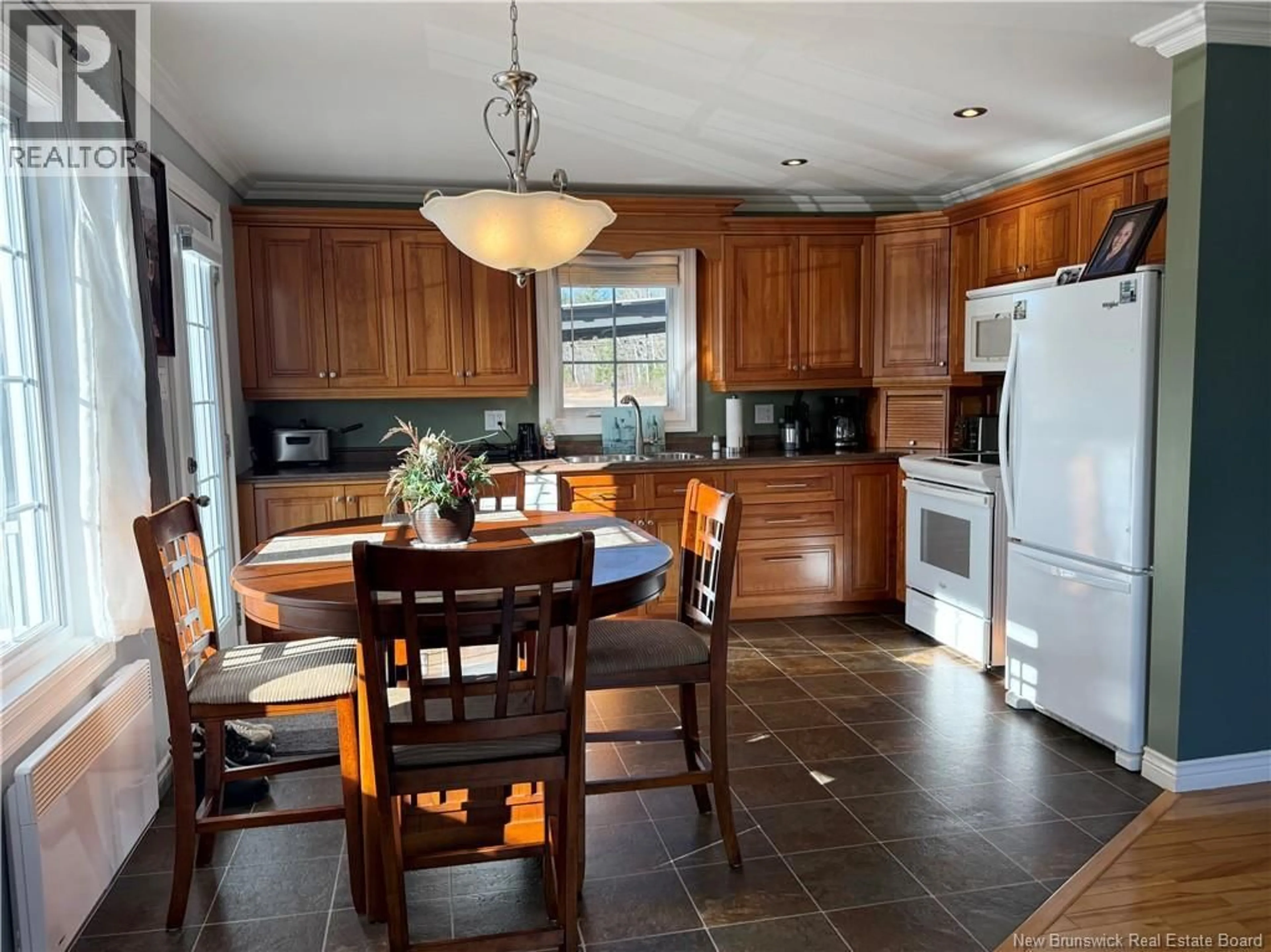 Open concept kitchen, ceramic/tile floor for 31 RUE HECTOR, Neguac New Brunswick E9G1H8