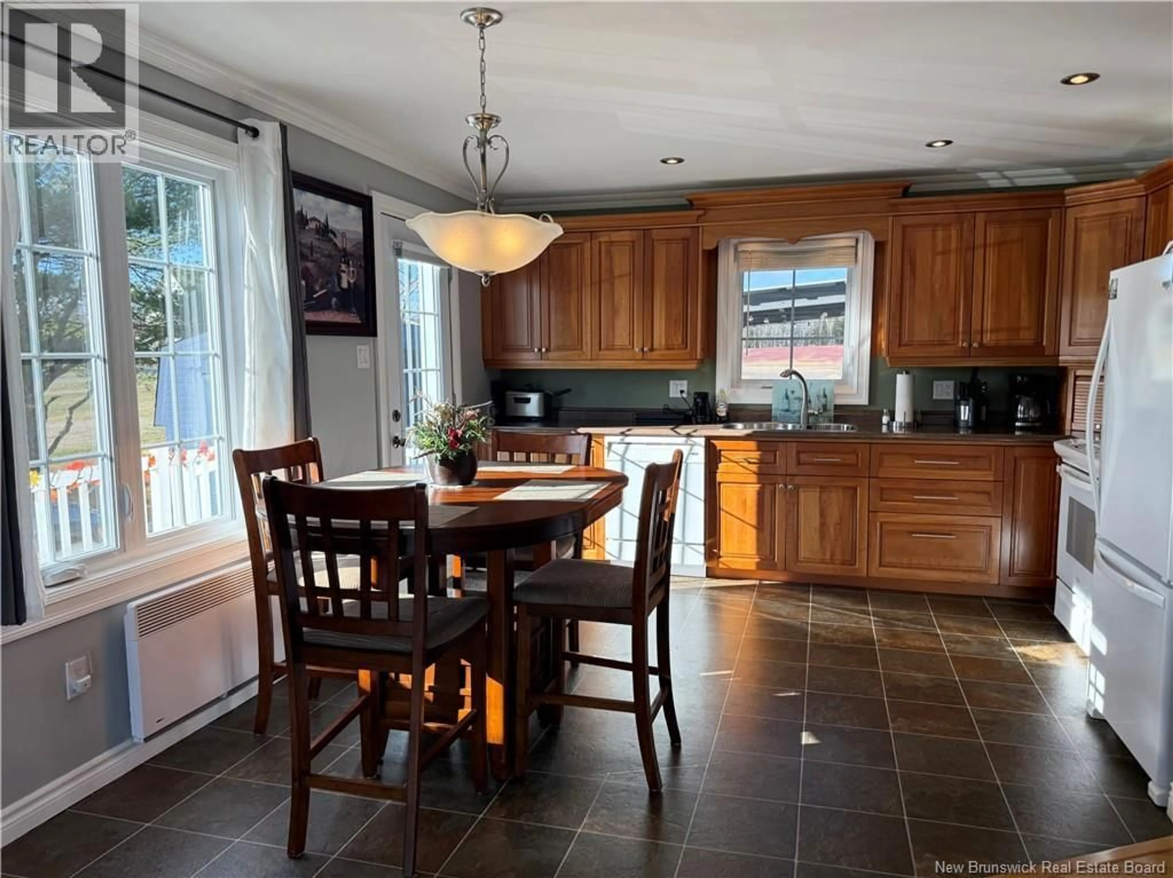 Open concept kitchen, ceramic/tile floor for 31 RUE HECTOR, Neguac New Brunswick E9G1H8