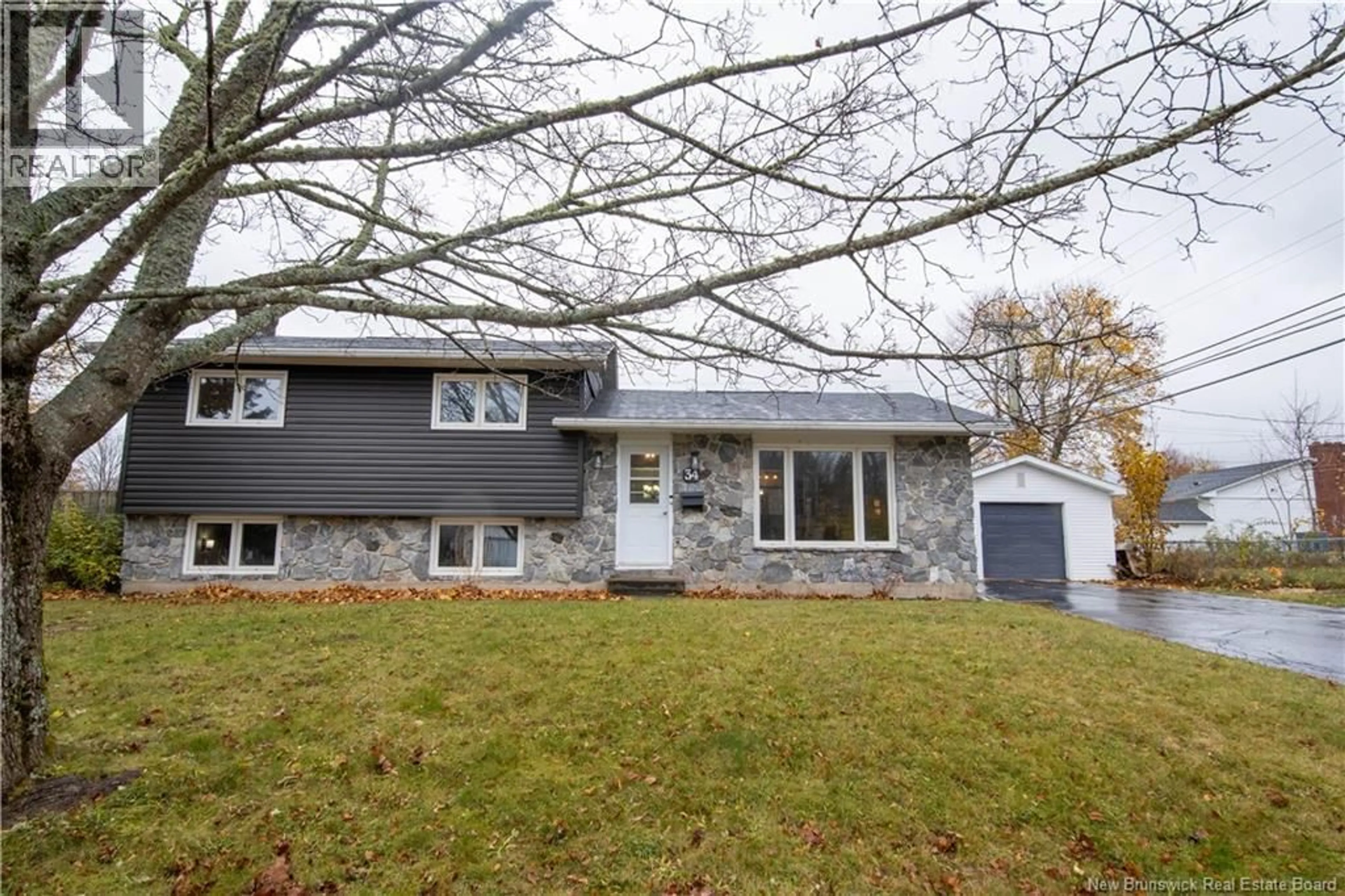 Home with vinyl exterior material, street for 34 MCDOWELL AVENUE, Riverview New Brunswick E1B4S1