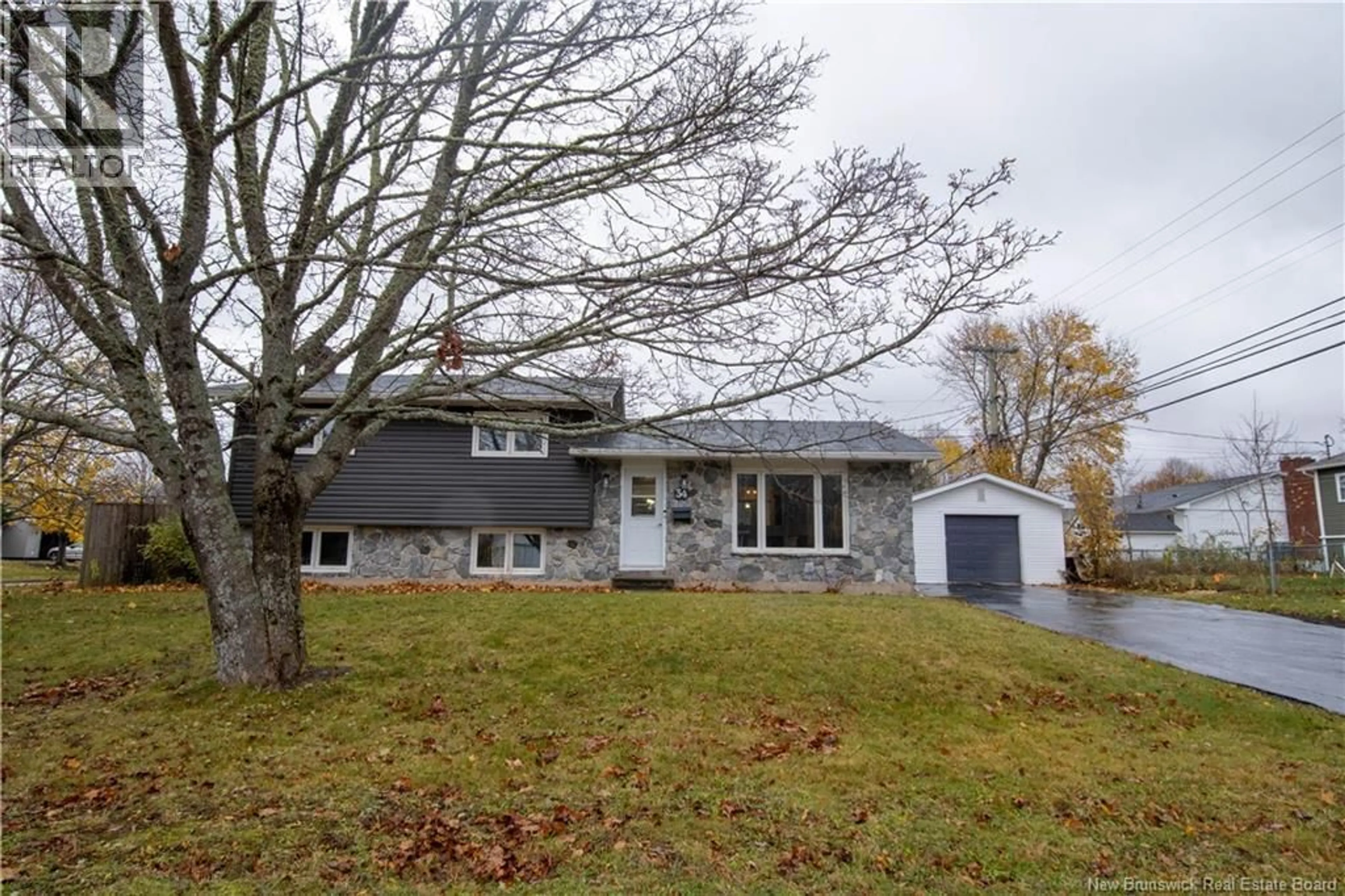 Home with vinyl exterior material, street for 34 MCDOWELL AVENUE, Riverview New Brunswick E1B4S1