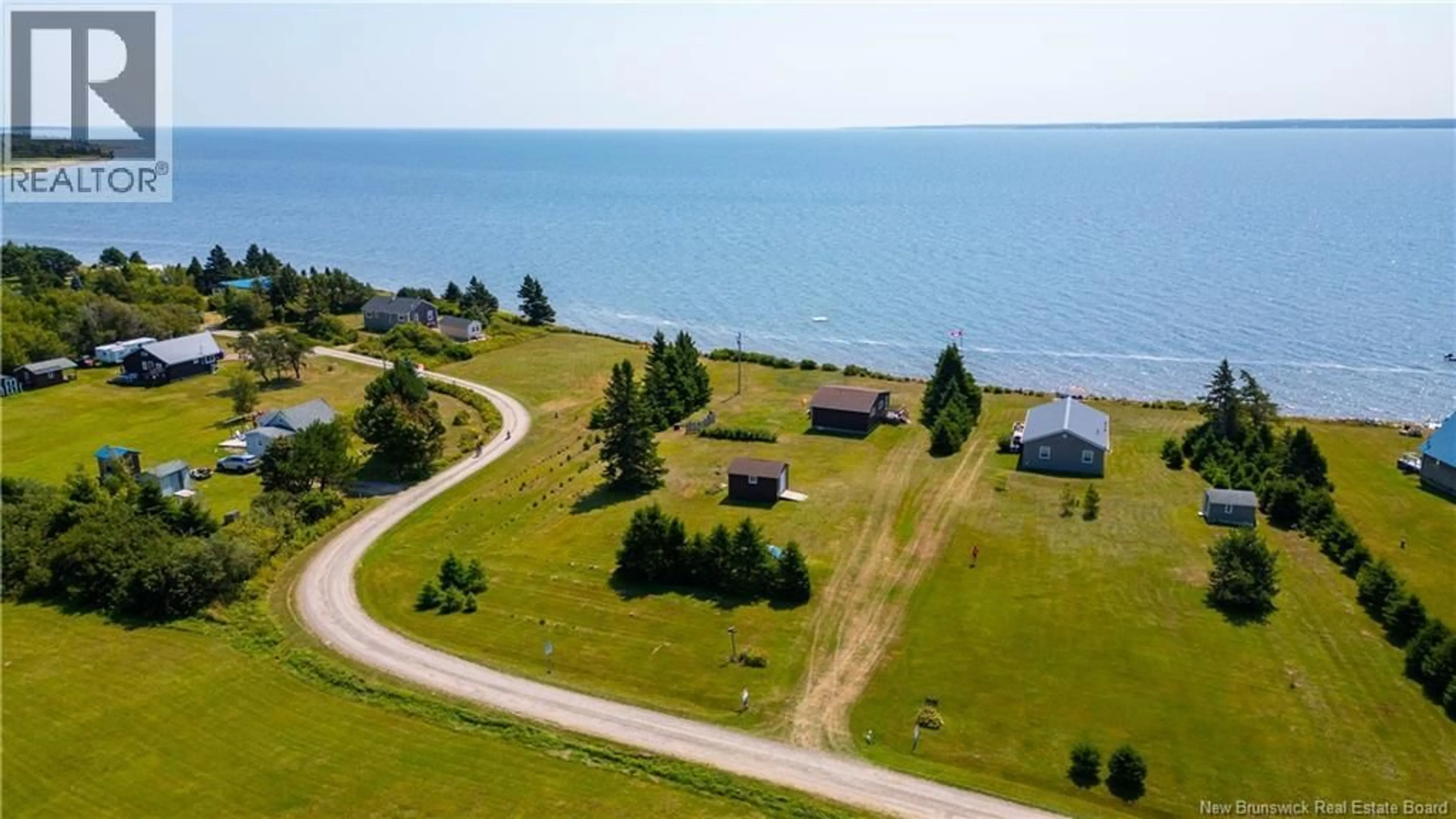A pic from outside/outdoor area/front of a property/back of a property/a pic from drone, water/lake/river/ocean view for 80 MONASH LANE, Cape Spear New Brunswick E4M2R9