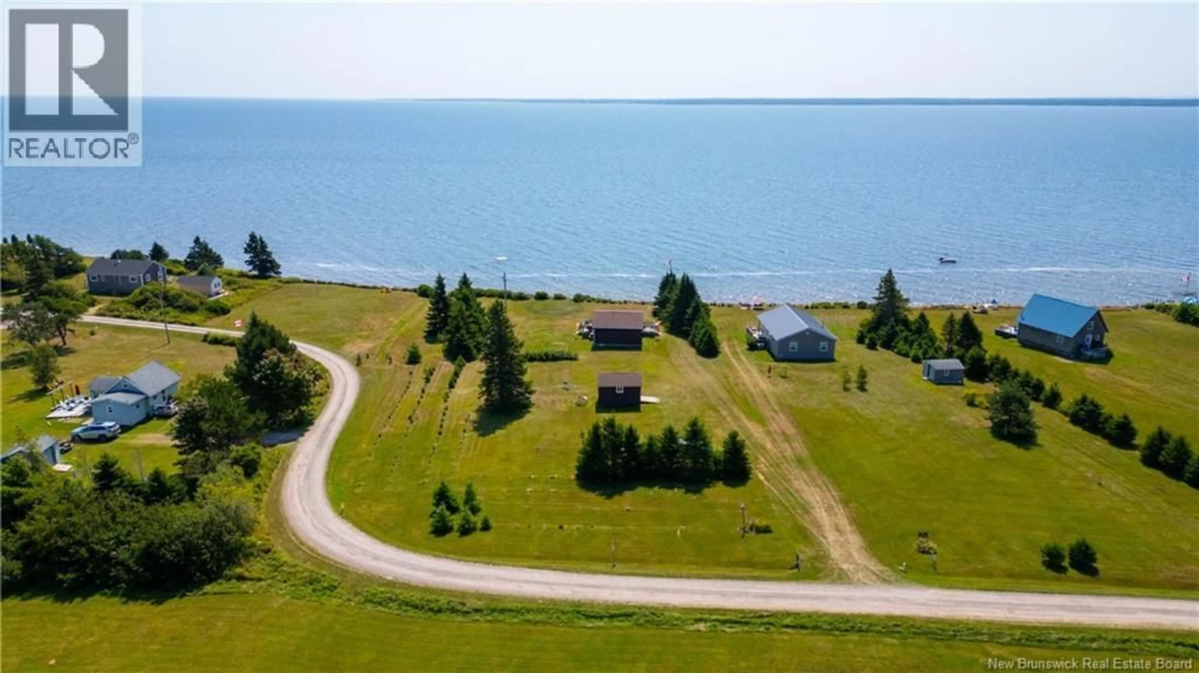 A pic from outside/outdoor area/front of a property/back of a property/a pic from drone, water/lake/river/ocean view for 80 MONASH LANE, Cape Spear New Brunswick E4M2R9